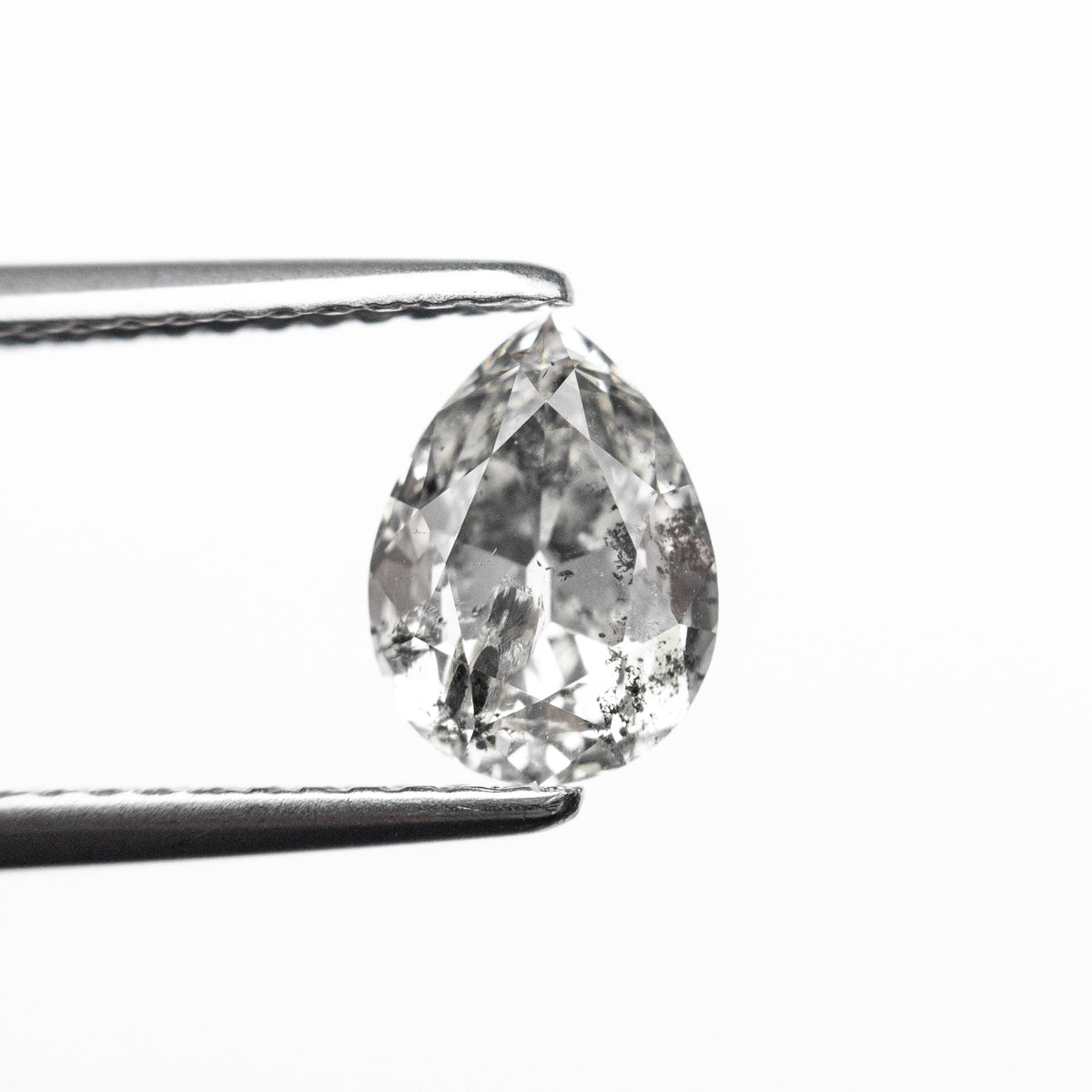 The 1.36ct 7.96x5.89x4.33mm Pear Brilliant 🇨🇦 27267-01 by East London jeweller Rachel Boston | Discover our collections of unique and timeless engagement rings, wedding rings, and modern fine jewellery.
