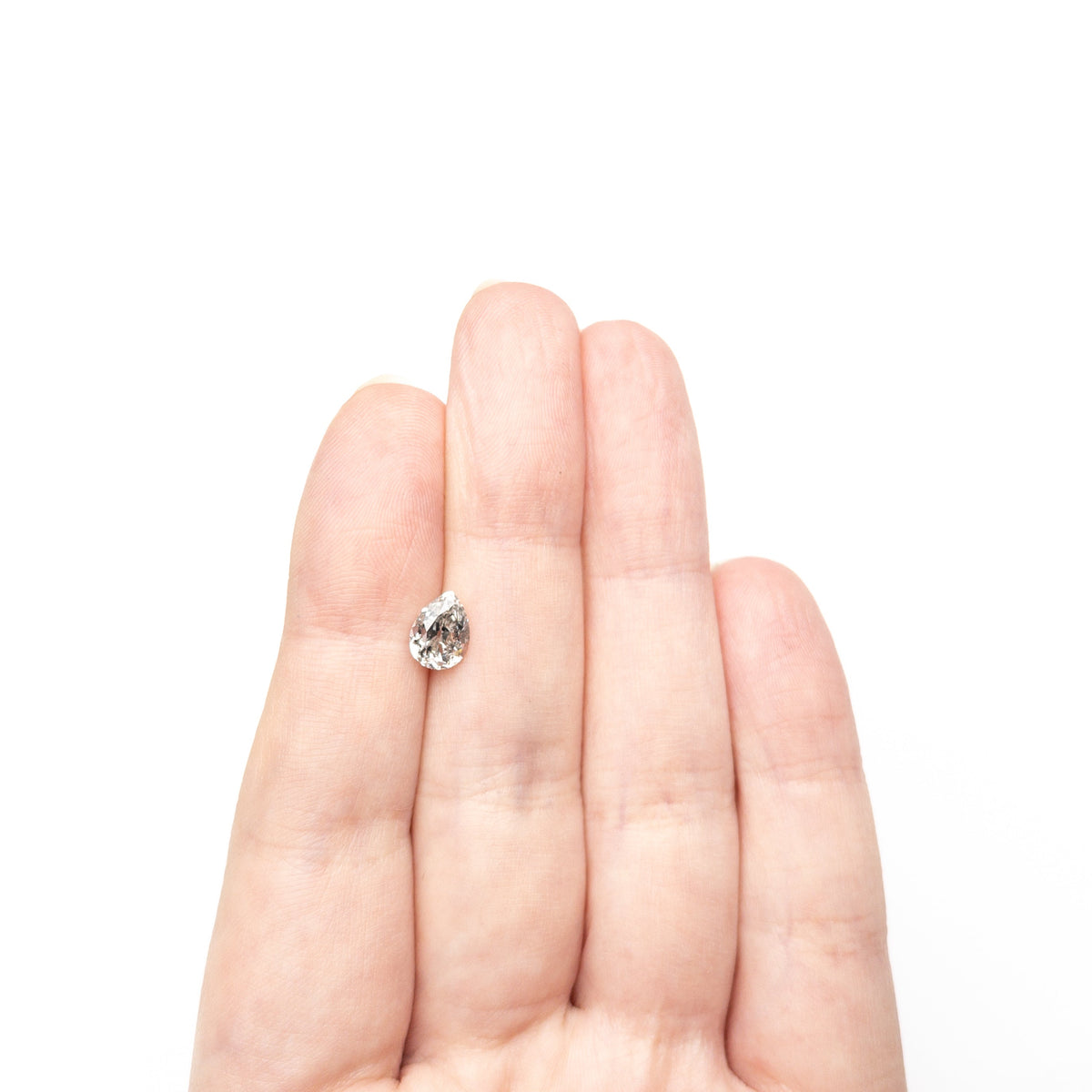 The 1.36ct 7.96x5.89x4.33mm Pear Brilliant 🇨🇦 27267-01 by East London jeweller Rachel Boston | Discover our collections of unique and timeless engagement rings, wedding rings, and modern fine jewellery.