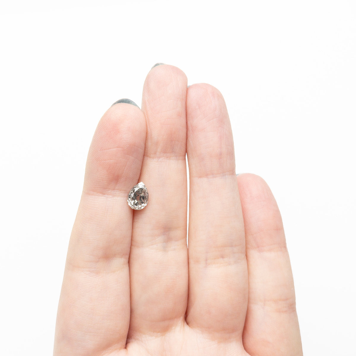 The 1.47ct 8.02x5.96x4.23mm Pear Brilliant 🇨🇦 27271-01 by East London jeweller Rachel Boston | Discover our collections of unique and timeless engagement rings, wedding rings, and modern fine jewellery.
