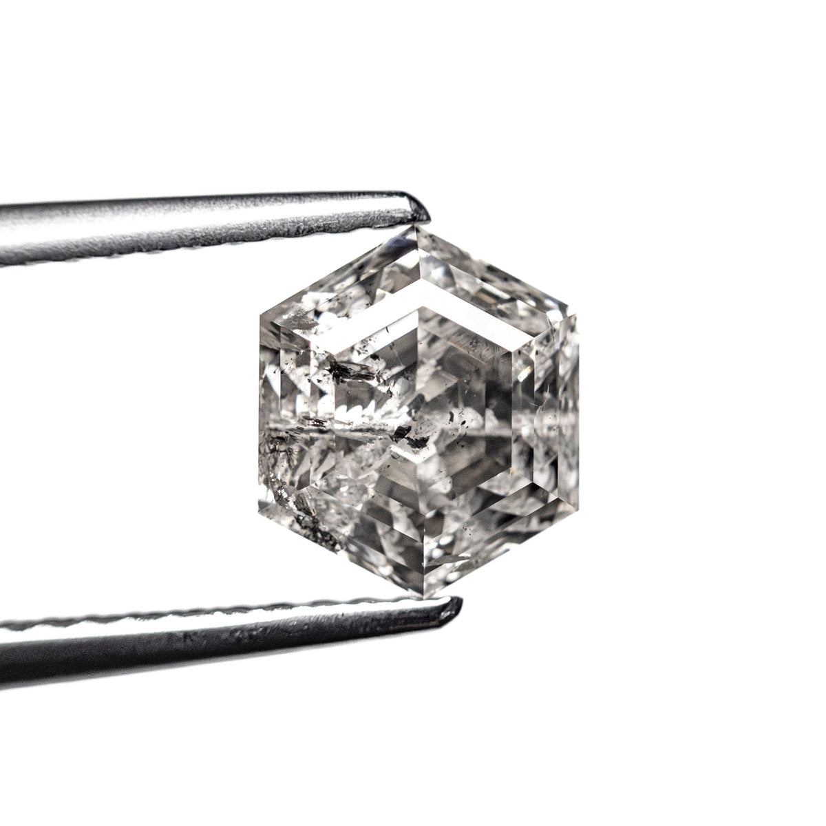 The 1.78ct 7.47x6.42x4.78mm Hexagon Step Cut 🇨🇦 27278-01 by East London jeweller Rachel Boston | Discover our collections of unique and timeless engagement rings, wedding rings, and modern fine jewellery.