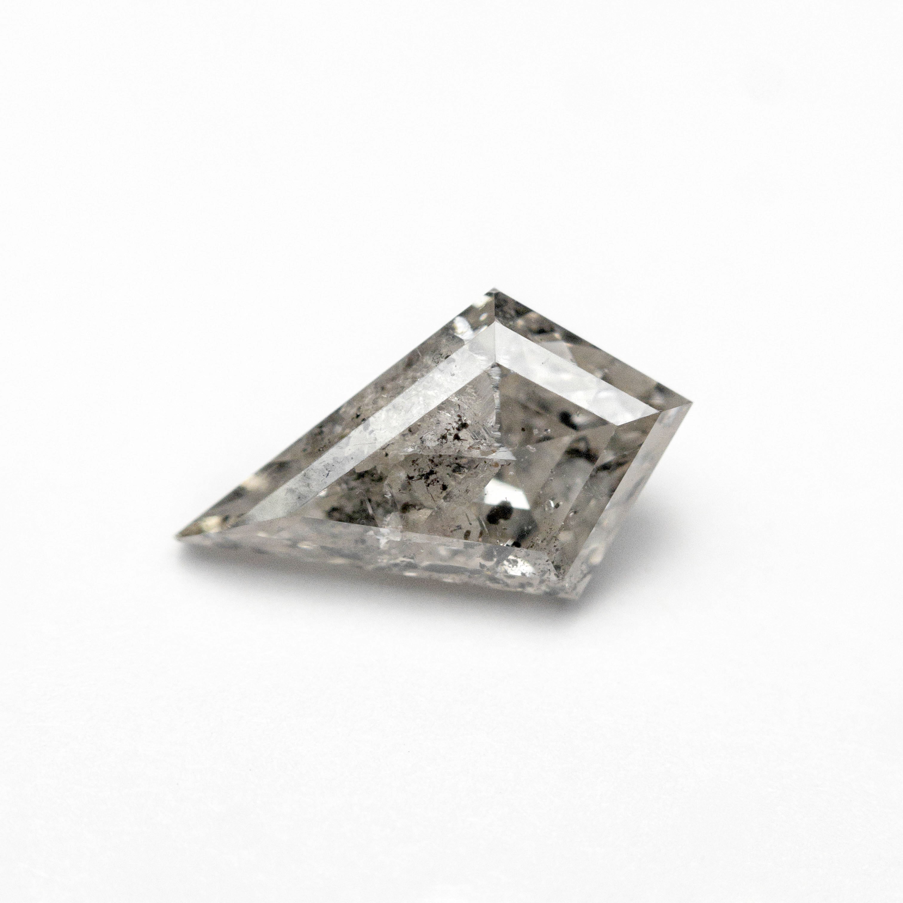 The 1.13ct 9.80x5.81x3.75mm Kite Step Cut 🇨🇦 27301-01 by East London jeweller Rachel Boston | Discover our collections of unique and timeless engagement rings, wedding rings, and modern fine jewellery.