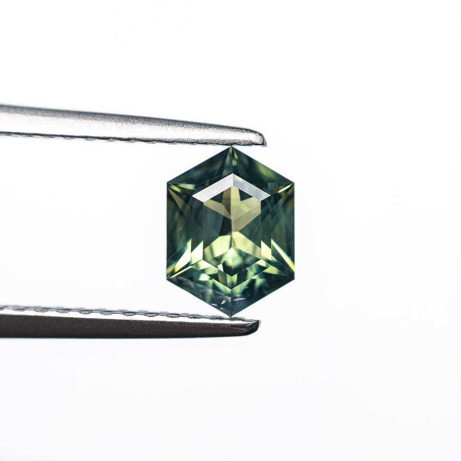 The 0.88ct 6.85x5.13x3.19mm Hexagon Step Cut Sapphire 27336-01 by East London jeweller Rachel Boston | Discover our collections of unique and timeless engagement rings, wedding rings, and modern fine jewellery. - Rachel Boston Jewellery