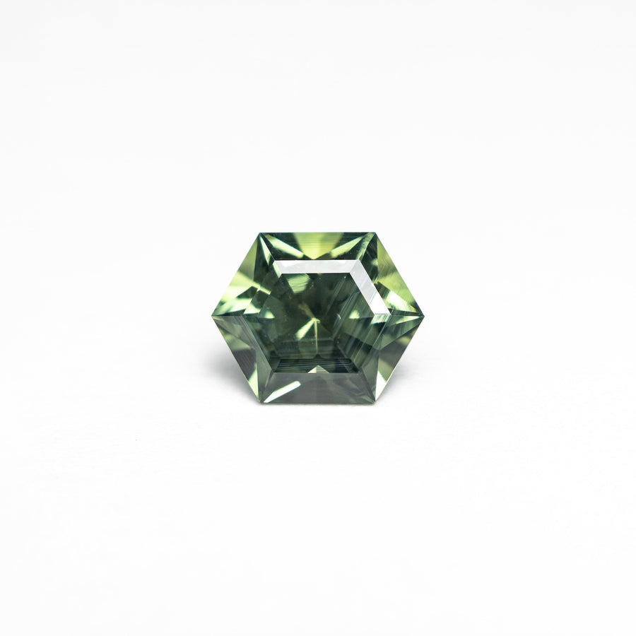 The 0.79ct 6.40x5.15x3.49mm Hexagon Step Cut Sapphire 27336-02 by East London jeweller Rachel Boston | Discover our collections of unique and timeless engagement rings, wedding rings, and modern fine jewellery. - Rachel Boston Jewellery