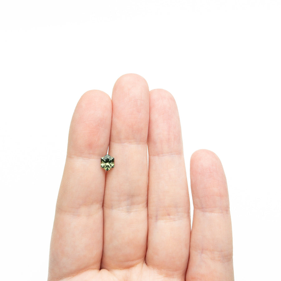 The 0.79ct 6.40x5.15x3.49mm Hexagon Step Cut Sapphire 27336-02 by East London jeweller Rachel Boston | Discover our collections of unique and timeless engagement rings, wedding rings, and modern fine jewellery. - Rachel Boston Jewellery