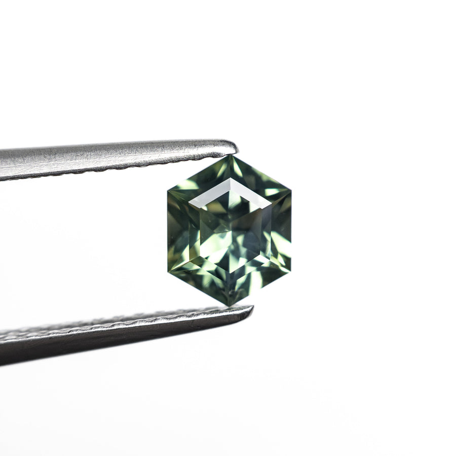 The 0.72ct 6.26x5.07x3.10mm Hexagon Step Cut Sapphire 27336-07 by East London jeweller Rachel Boston | Discover our collections of unique and timeless engagement rings, wedding rings, and modern fine jewellery. - Rachel Boston Jewellery