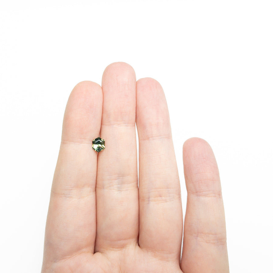 The 0.72ct 6.26x5.07x3.10mm Hexagon Step Cut Sapphire 27336-07 by East London jeweller Rachel Boston | Discover our collections of unique and timeless engagement rings, wedding rings, and modern fine jewellery. - Rachel Boston Jewellery