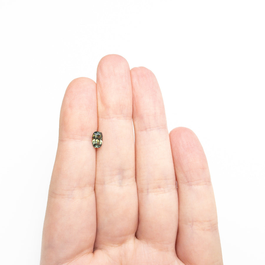 The 0.75ct 6.54x4.27x3.15mm Cushion Brilliant Sapphire 27336-10 by East London jeweller Rachel Boston | Discover our collections of unique and timeless engagement rings, wedding rings, and modern fine jewellery. - Rachel Boston Jewellery