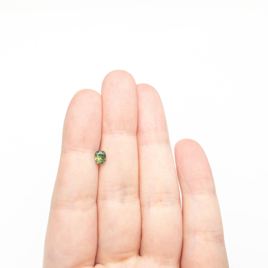 The 0.78ct 5.27x4.59x4.03mm Cushion Brilliant Sapphire 27336-14 by East London jeweller Rachel Boston | Discover our collections of unique and timeless engagement rings, wedding rings, and modern fine jewellery. - Rachel Boston Jewellery