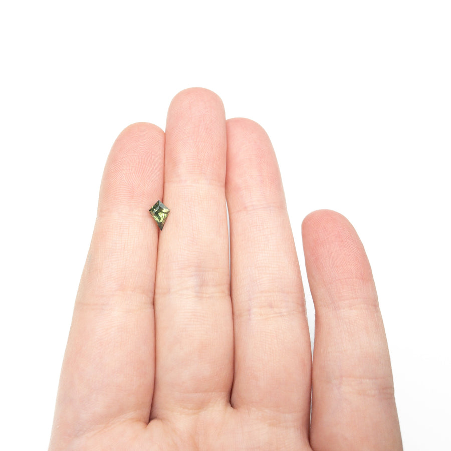 The 0.67ct 7.58x5.02x3.65mm Kite Step Cut Sapphire 27336-16 by East London jeweller Rachel Boston | Discover our collections of unique and timeless engagement rings, wedding rings, and modern fine jewellery. - Rachel Boston Jewellery