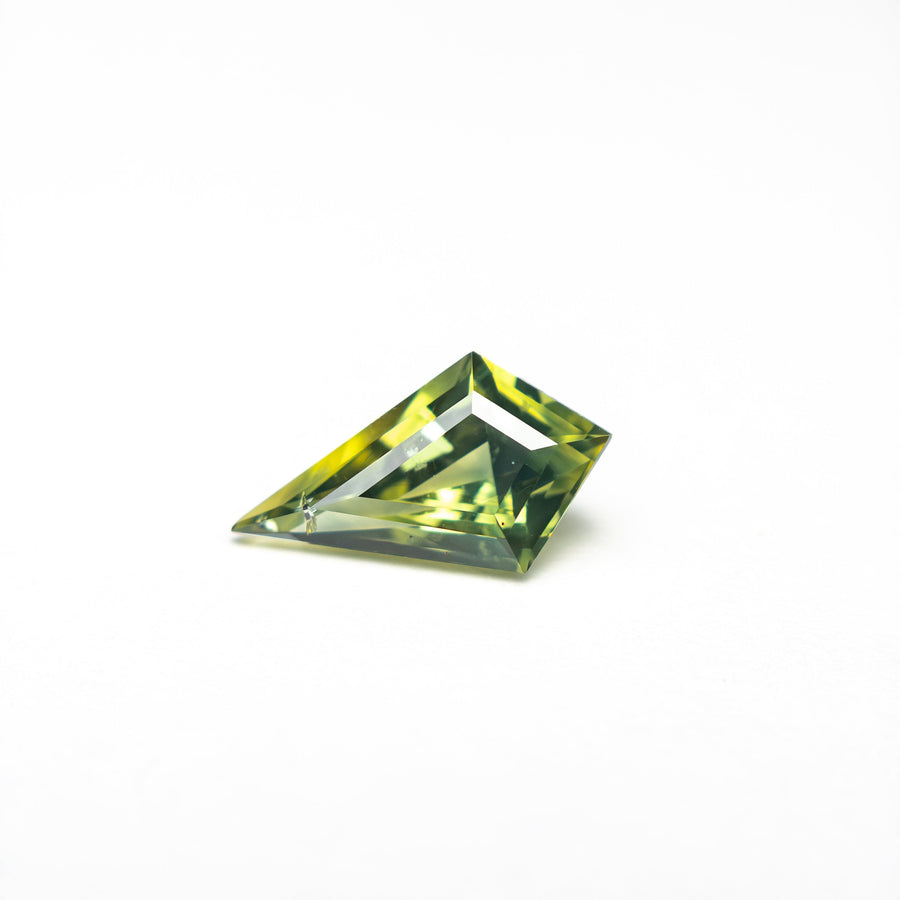 The 0.60ct 8.29x4.45x3.00mm Kite Step Cut Sapphire 27336-17 by East London jeweller Rachel Boston | Discover our collections of unique and timeless engagement rings, wedding rings, and modern fine jewellery. - Rachel Boston Jewellery