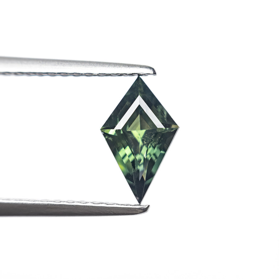 The 0.70ct 8.41x5.25x3.13mm Kite Step Cut Sapphire 27336-18 by East London jeweller Rachel Boston | Discover our collections of unique and timeless engagement rings, wedding rings, and modern fine jewellery. - Rachel Boston Jewellery