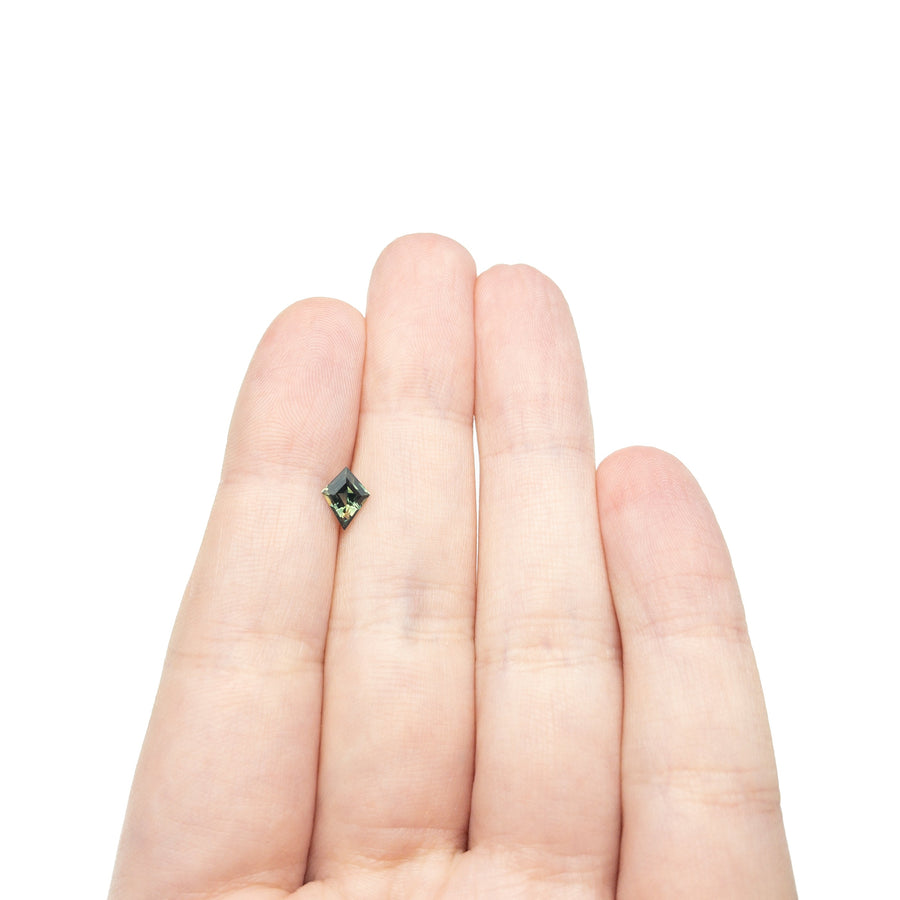 The 0.66ct 7.66x4.86x3.08mm Kite Step Cut Sapphire 27336-24 by East London jeweller Rachel Boston | Discover our collections of unique and timeless engagement rings, wedding rings, and modern fine jewellery. - Rachel Boston Jewellery