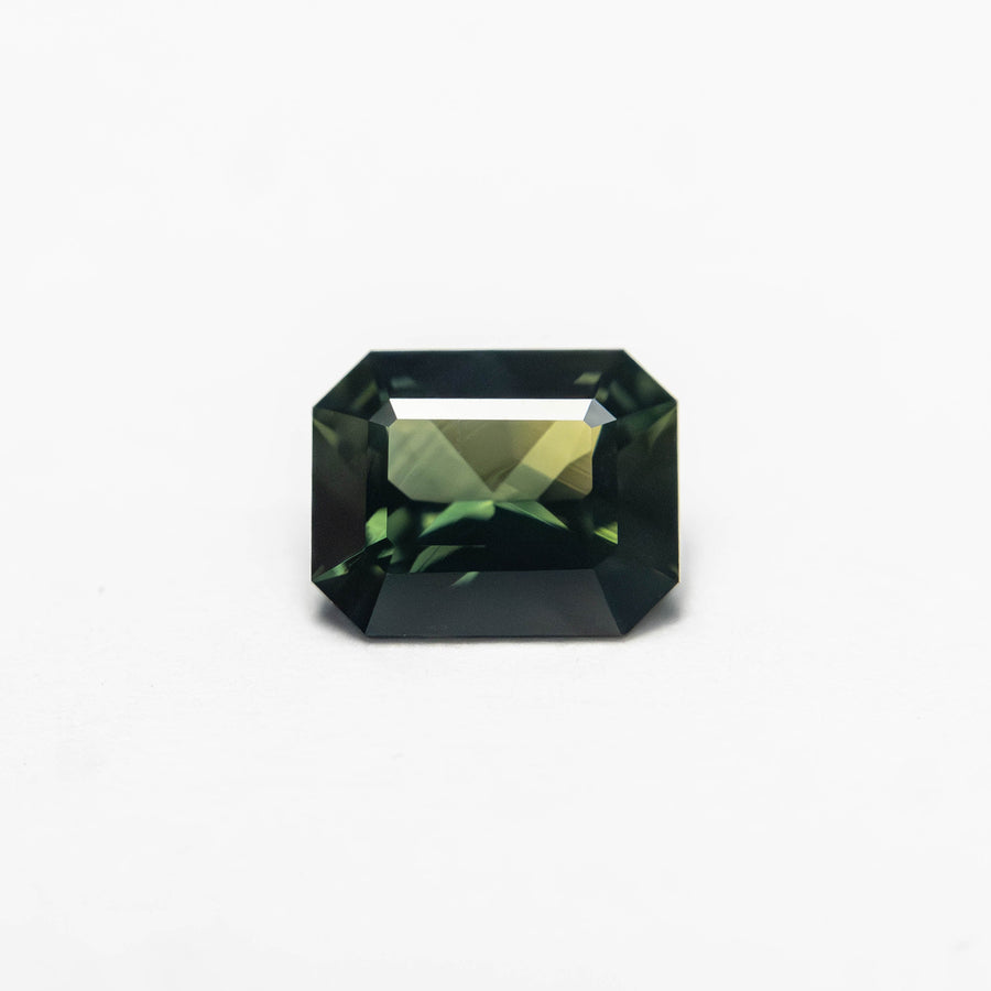 The 0.69ct 5.89x4.67x2.82mm Cut Corner Rectangle Step Cut Sapphire 27336-28 by East London jeweller Rachel Boston | Discover our collections of unique and timeless engagement rings, wedding rings, and modern fine jewellery. - Rachel Boston Jewellery