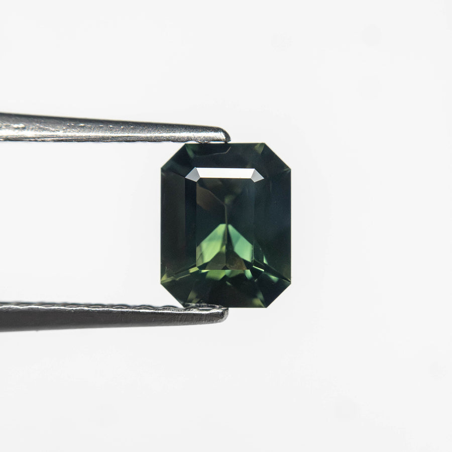 The 0.69ct 5.89x4.67x2.82mm Cut Corner Rectangle Step Cut Sapphire 27336-28 by East London jeweller Rachel Boston | Discover our collections of unique and timeless engagement rings, wedding rings, and modern fine jewellery. - Rachel Boston Jewellery