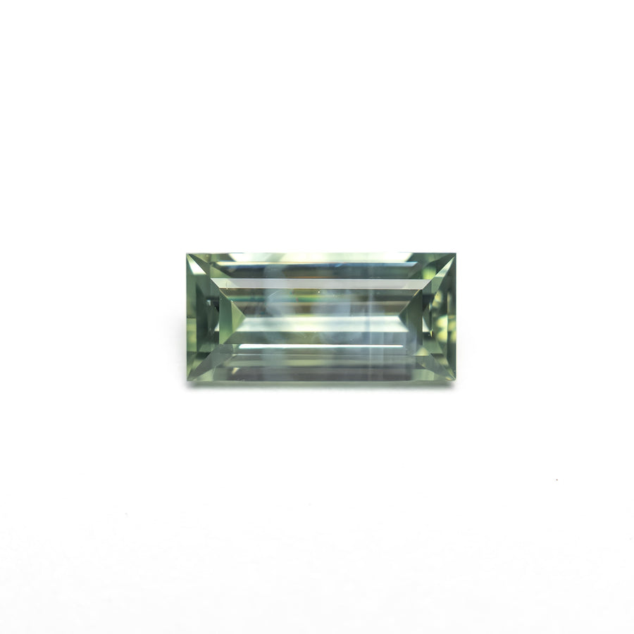 The 0.76ct 7.33x3.57x2.54mm Rectangle Step Cut Sapphire 27336-45 by East London jeweller Rachel Boston | Discover our collections of unique and timeless engagement rings, wedding rings, and modern fine jewellery. - Rachel Boston Jewellery