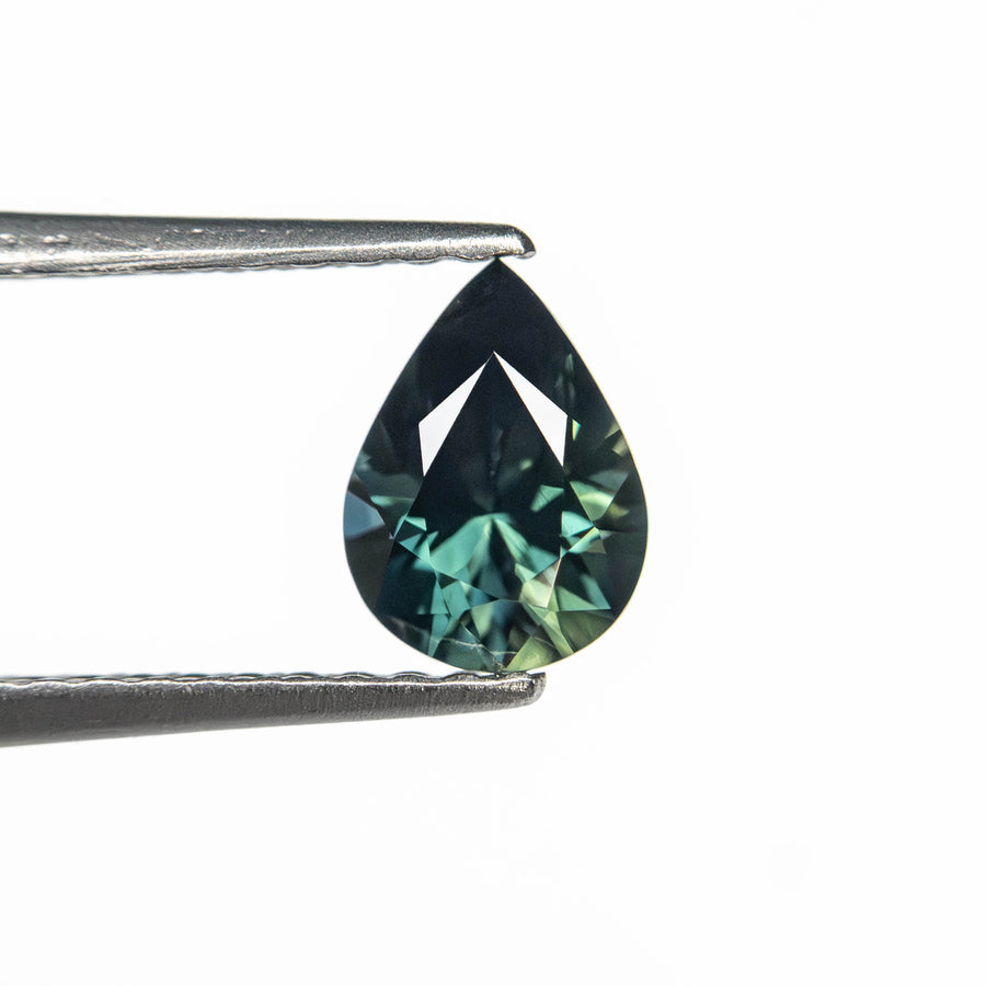 The 0.65ct 6.50x4.77x3.35mm Pear Brilliant Sapphire 27363-05 by East London jeweller Rachel Boston | Discover our collections of unique and timeless engagement rings, wedding rings, and modern fine jewellery. - Rachel Boston Jewellery