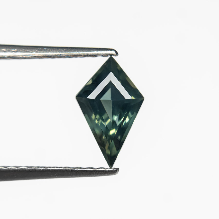 The 0.67ct 8.12x4.94x3.15mm Kite Step Cut Sapphire 27363-15 by East London jeweller Rachel Boston | Discover our collections of unique and timeless engagement rings, wedding rings, and modern fine jewellery. - Rachel Boston Jewellery