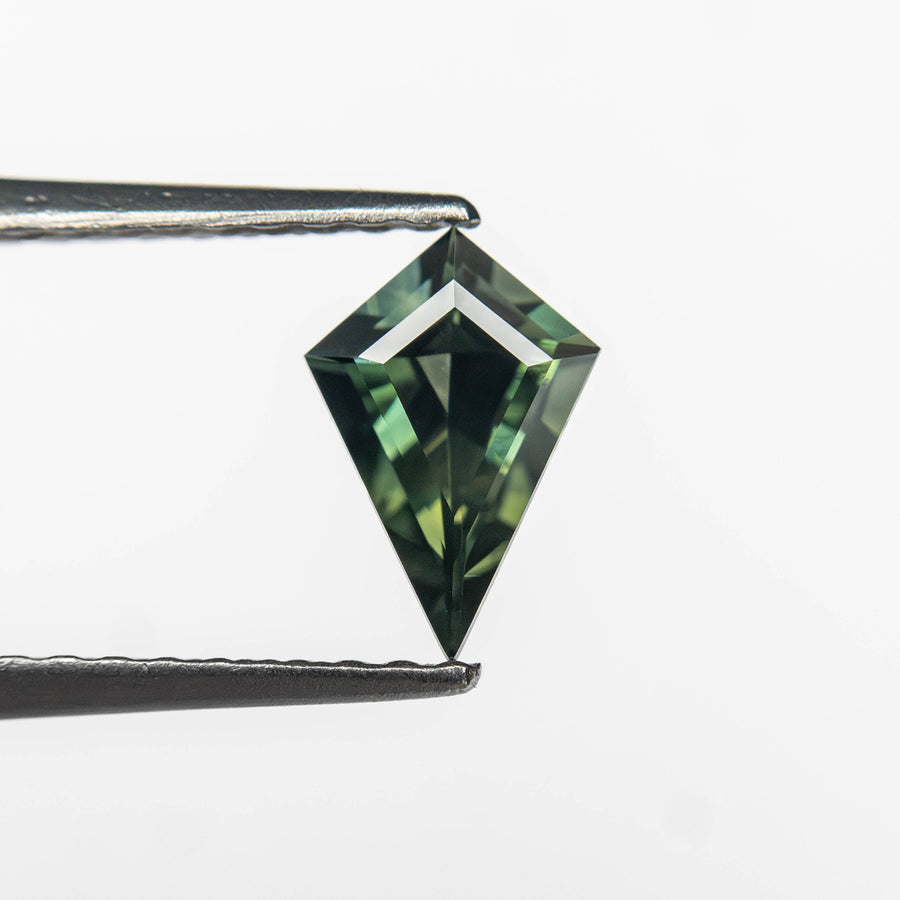 The 0.50ct 7.34x4.96x2.87mm Kite Step Cut Sapphire 27363-16 by East London jeweller Rachel Boston | Discover our collections of unique and timeless engagement rings, wedding rings, and modern fine jewellery. - Rachel Boston Jewellery