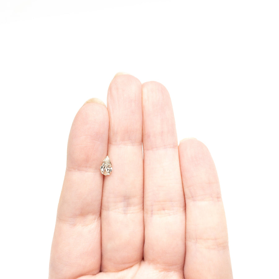 The 0.71ct 7.85x4.68x2.90mm VVS2 Q-R Geo Pear Step Cut 🇿🇦 27364-15 by East London jeweller Rachel Boston | Discover our collections of unique and timeless engagement rings, wedding rings, and modern fine jewellery. - Rachel Boston Jewellery