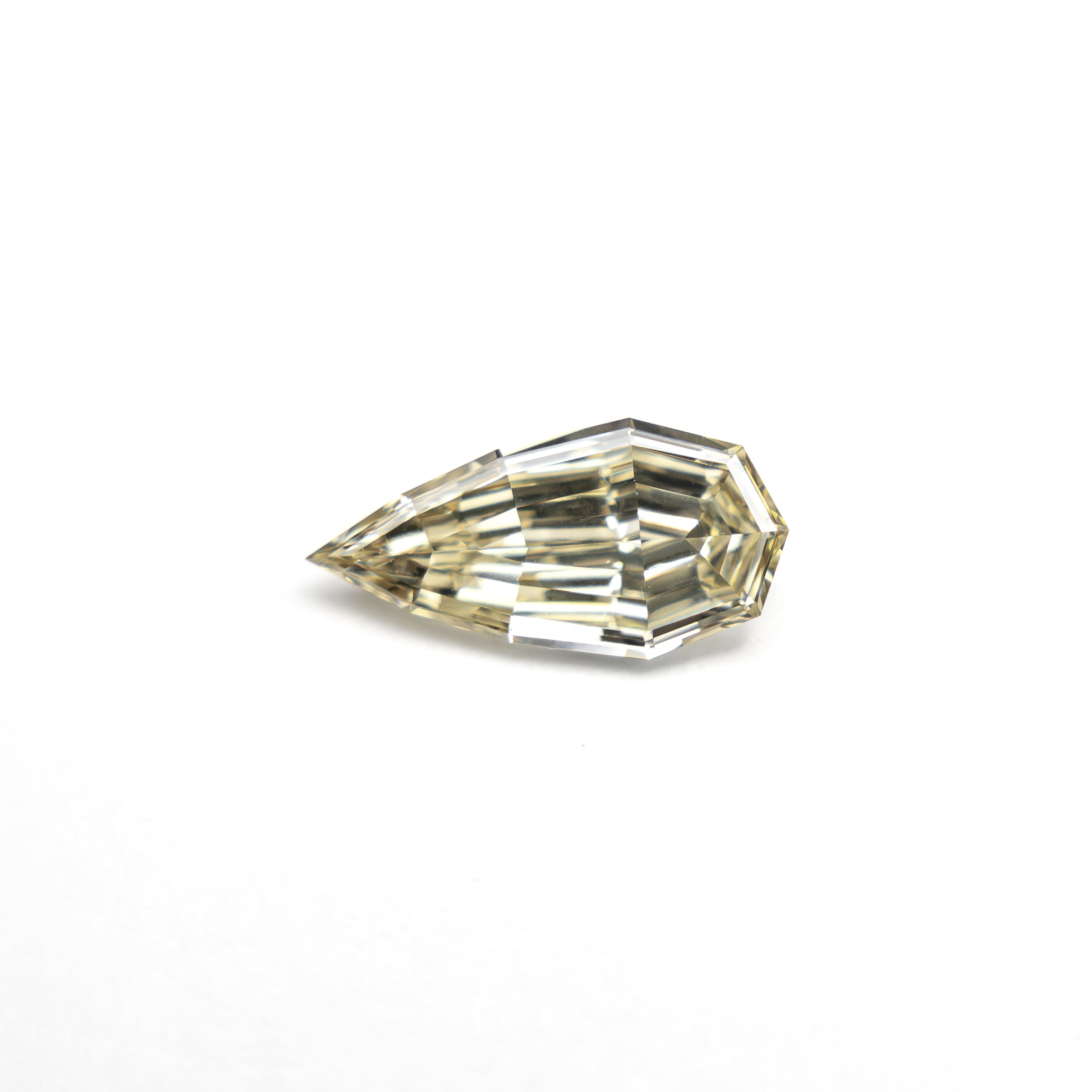 The 0.42ct 8.18x4.09x1.92mm VS2 C5 Geo Pear Step Cut 🇿🇦 27364-17 by East London jeweller Rachel Boston | Discover our collections of unique and timeless engagement rings, wedding rings, and modern fine jewellery.