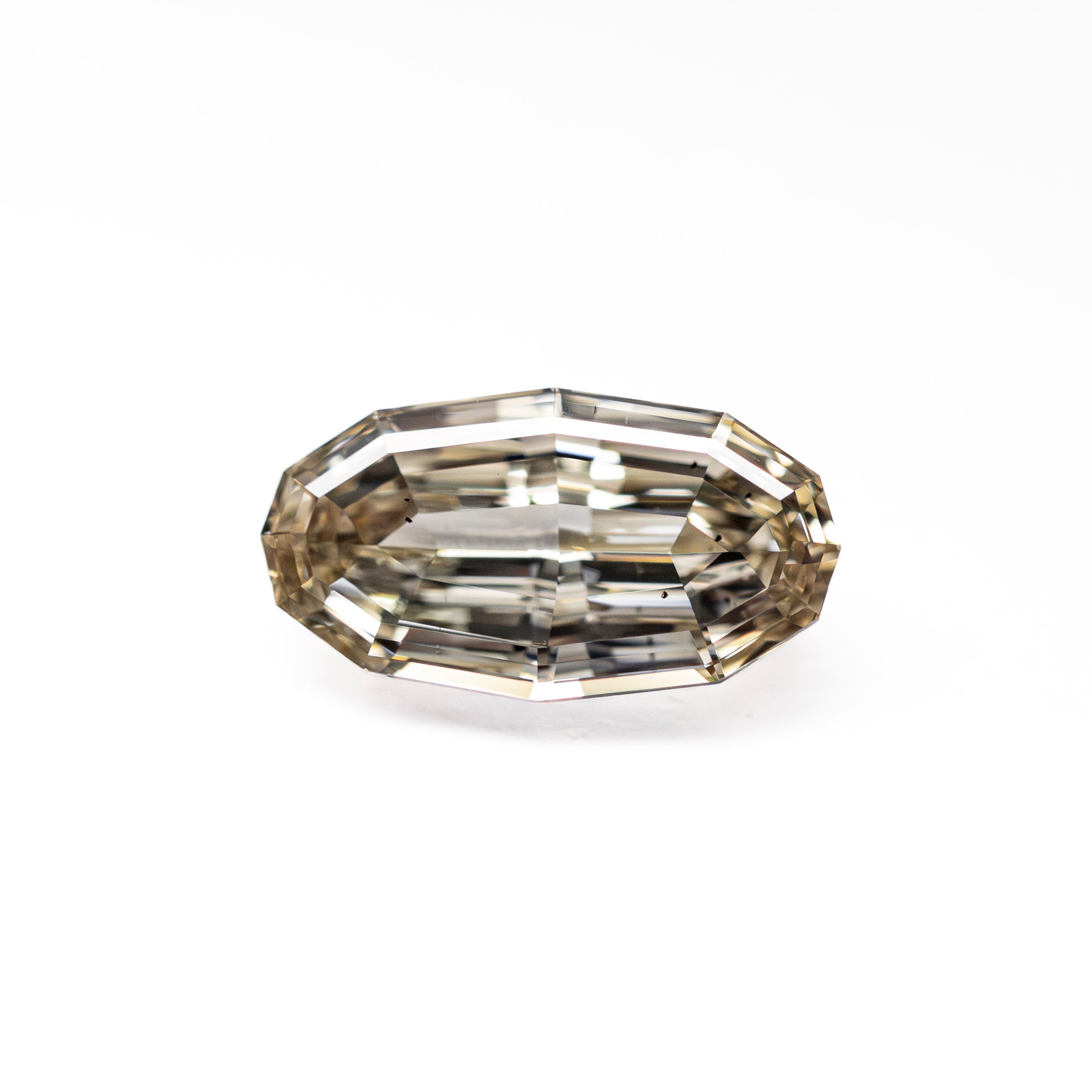 The 0.97ct 8.81x4.74x2.72mm SI1 C3 Geo Oval Step Cut 🇿🇦 27375-07 by East London jeweller Rachel Boston | Discover our collections of unique and timeless engagement rings, wedding rings, and modern fine jewellery.