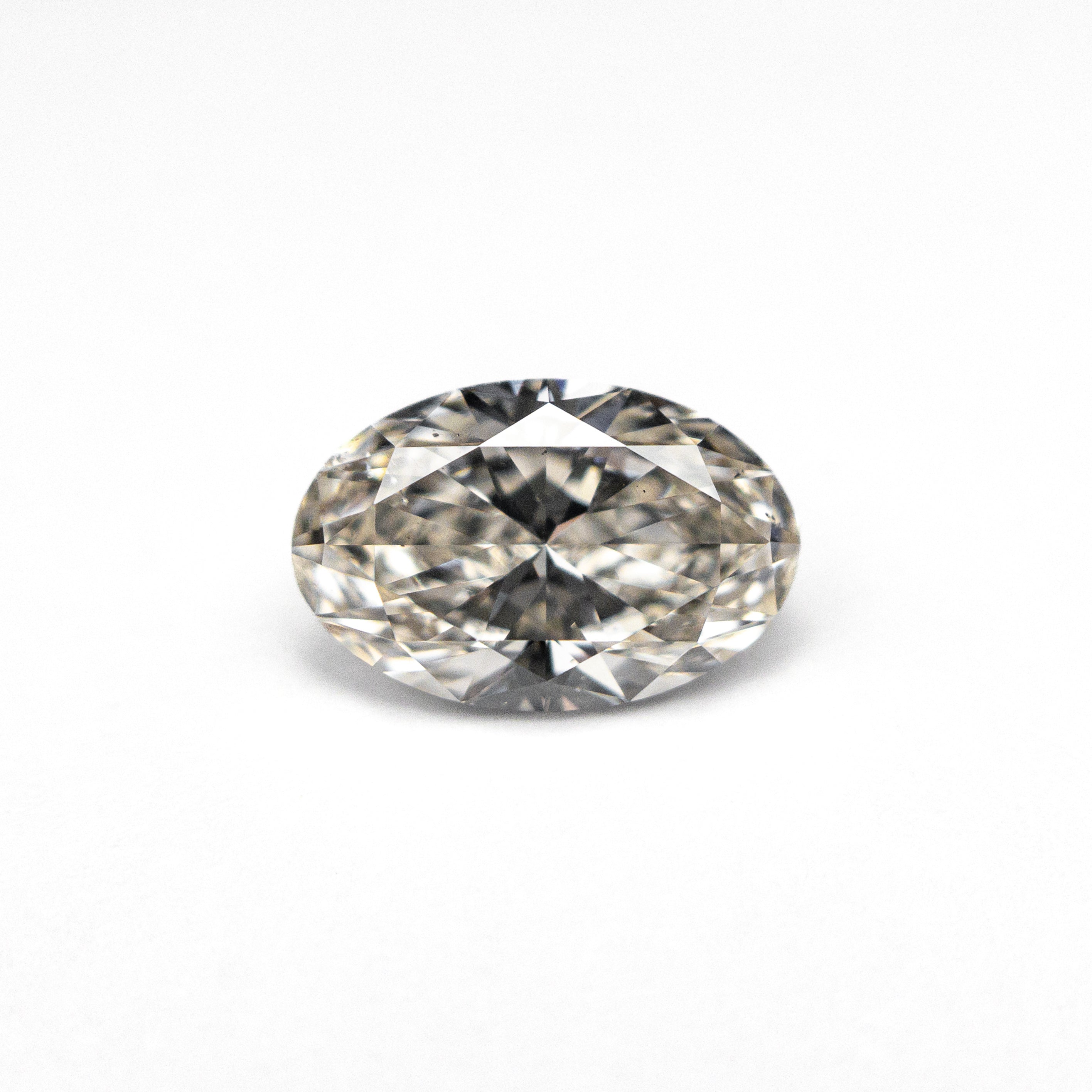 The 1.00ct 8.19x5.37x3.33mm SI1 M Oval Brilliant 🇨🇦 27376-04 by East London jeweller Rachel Boston | Discover our collections of unique and timeless engagement rings, wedding rings, and modern fine jewellery.