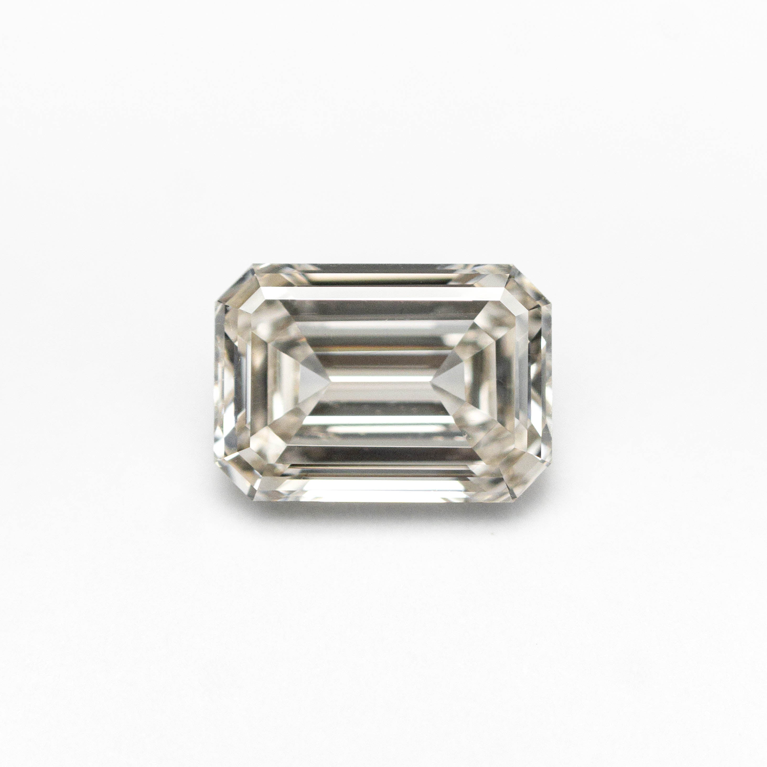 The 1.00ct 6.86x4.84x2.86mm VS1 L Cut Corner Rectangle Step Cut 27376-08 by East London jeweller Rachel Boston | Discover our collections of unique and timeless engagement rings, wedding rings, and modern fine jewellery.