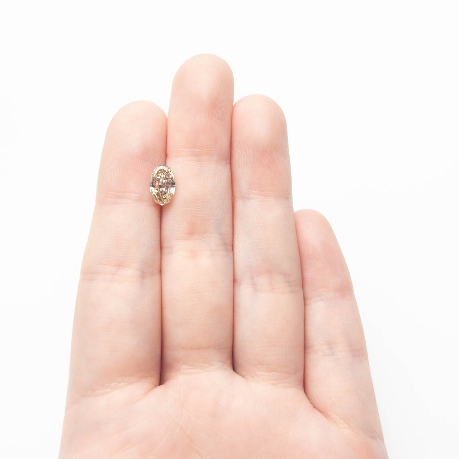 The 1.50ct 9.60x6.02x3.44mm VS2 C4 Geo Oval Step Cut 27384-01 by East London jeweller Rachel Boston | Discover our collections of unique and timeless engagement rings, wedding rings, and modern fine jewellery. - Rachel Boston Jewellery