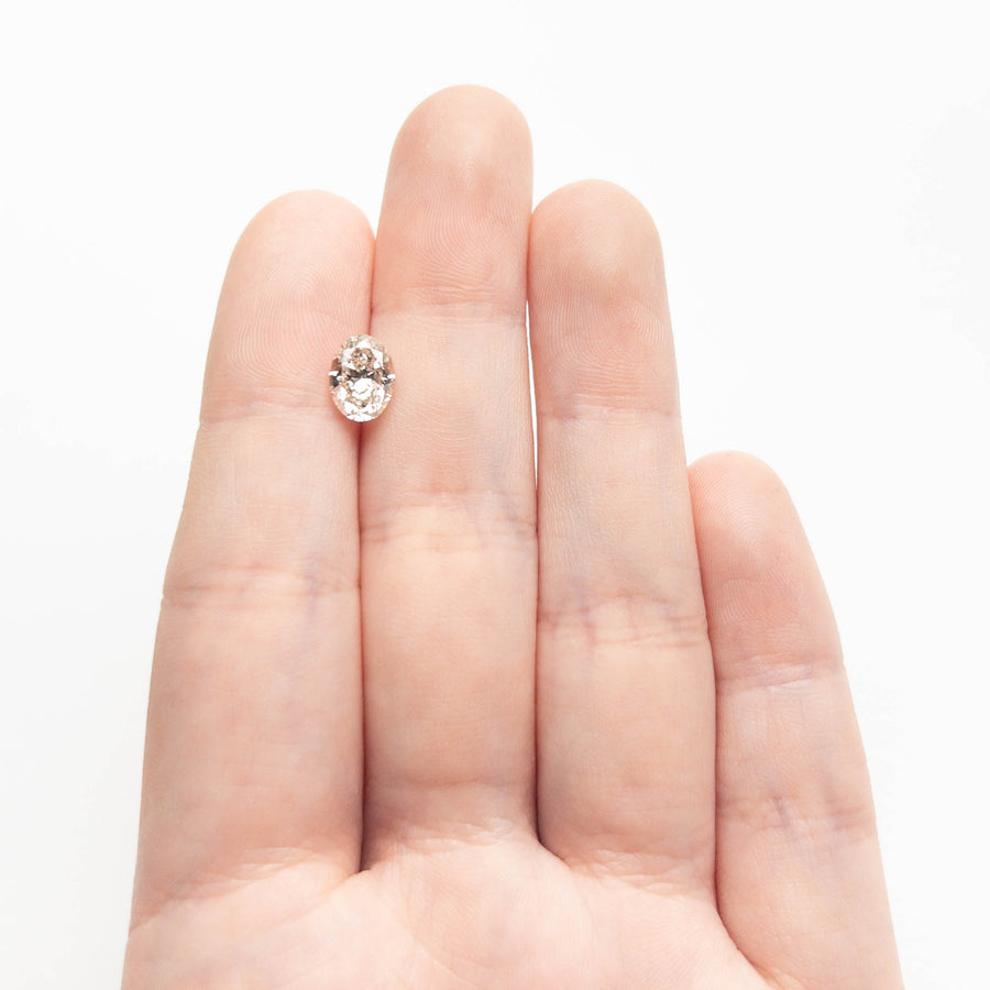 The 1.50ct 8.46x6.25x4.17mm VS2 K Oval Brilliant 27386-01 by East London jeweller Rachel Boston | Discover our collections of unique and timeless engagement rings, wedding rings, and modern fine jewellery. - Rachel Boston Jewellery