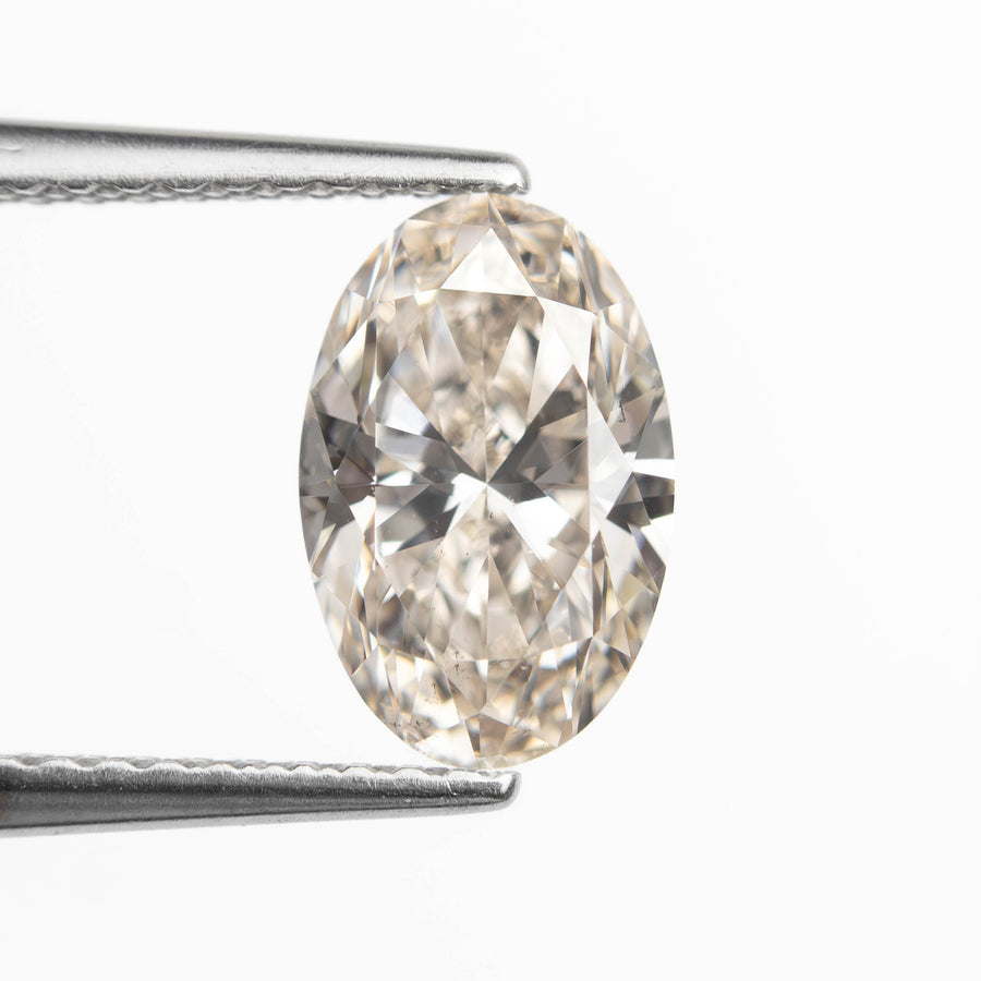 The 1.50ct 9.27x6.07x3.96mm SI2 K Oval Brilliant 27386-02 by East London jeweller Rachel Boston | Discover our collections of unique and timeless engagement rings, wedding rings, and modern fine jewellery. - Rachel Boston Jewellery