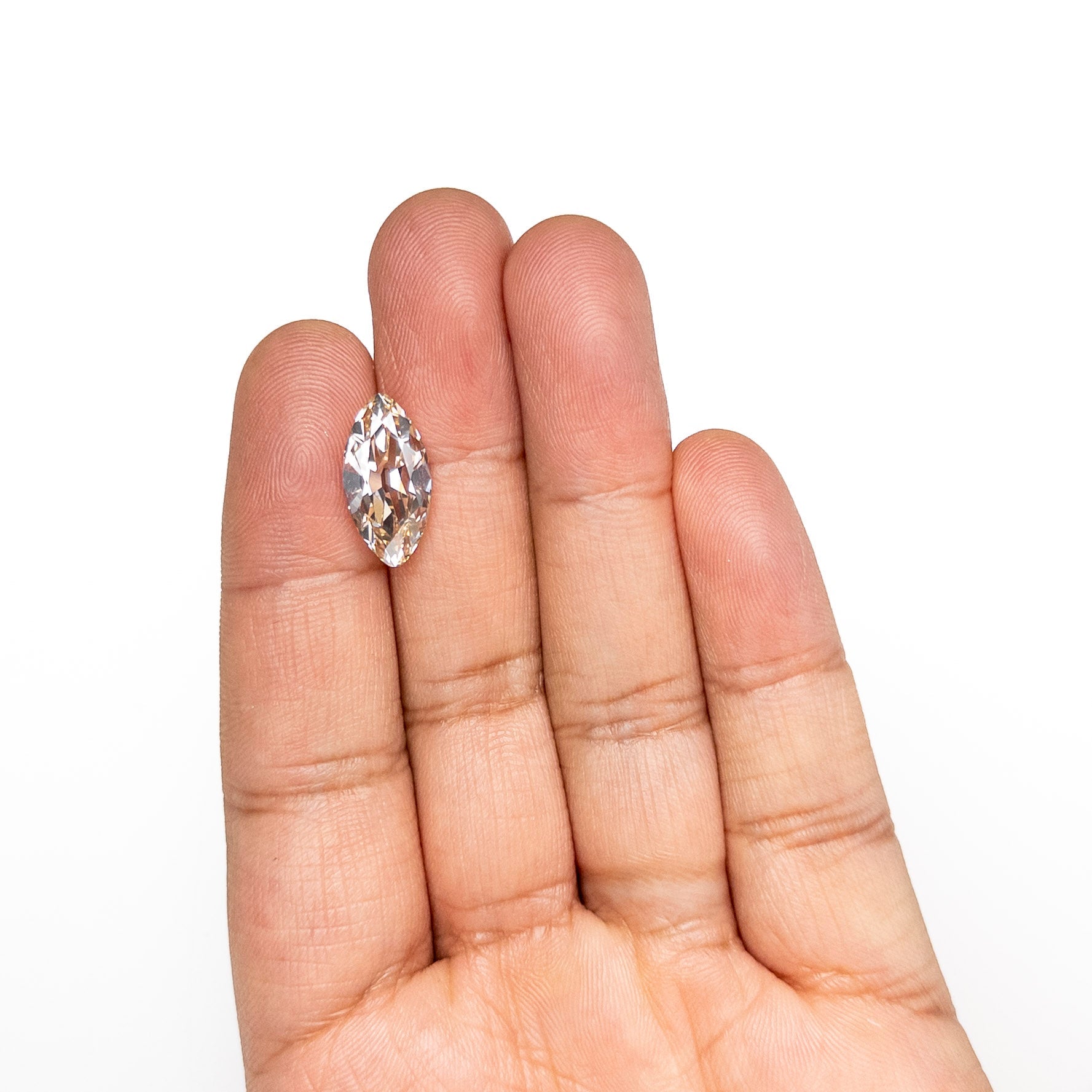 The 5.51ct 17.14x8.70x5.50mm GIA VS2 S-T Modern Antique Moval Brilliant 27406-01 by East London jeweller Rachel Boston | Discover our collections of unique and timeless engagement rings, wedding rings, and modern fine jewellery.