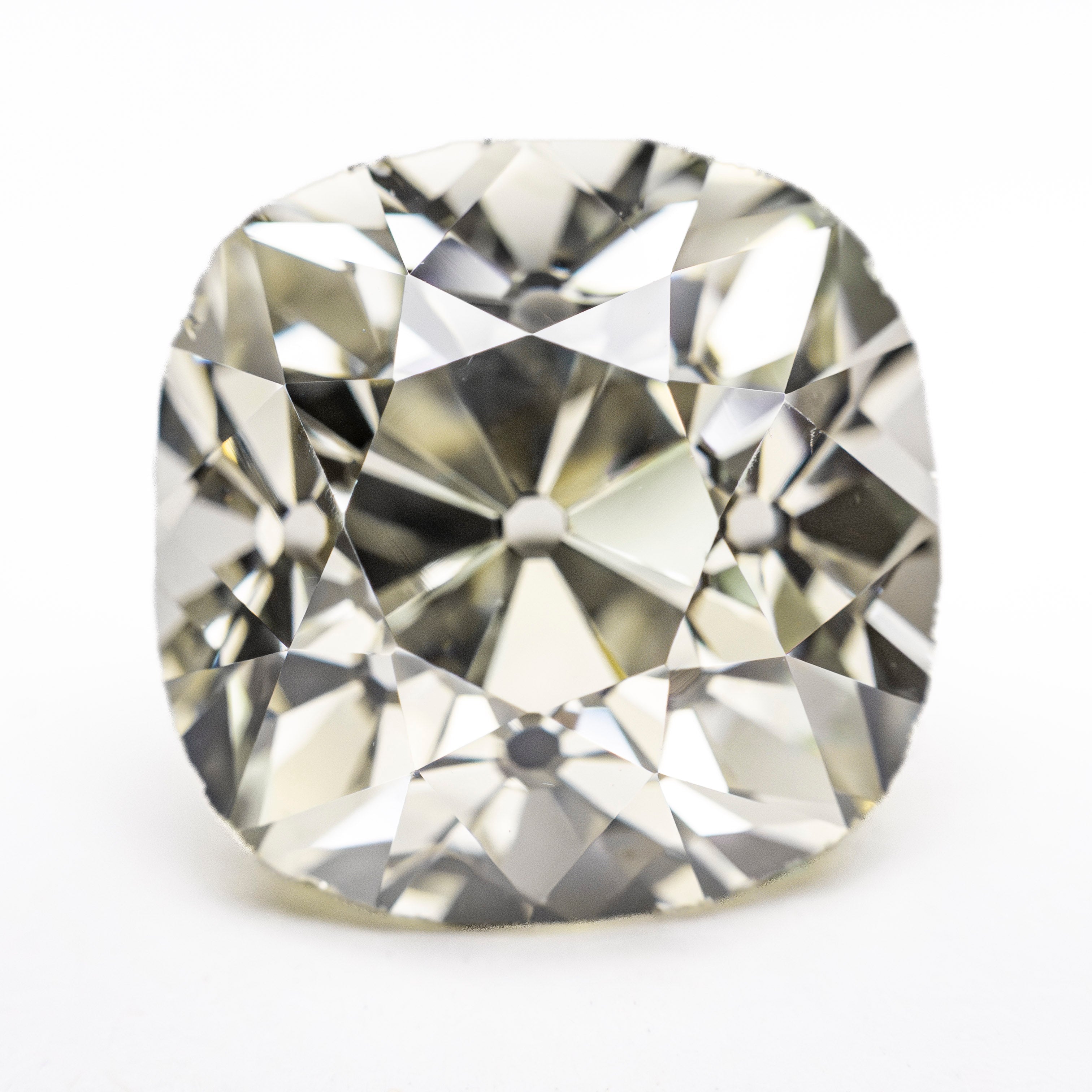 The 8.86ct 12.26x12.17x9.14mm GIA VS2 S-T Antique Old Mine Cut 27425-01 by East London jeweller Rachel Boston | Discover our collections of unique and timeless engagement rings, wedding rings, and modern fine jewellery.