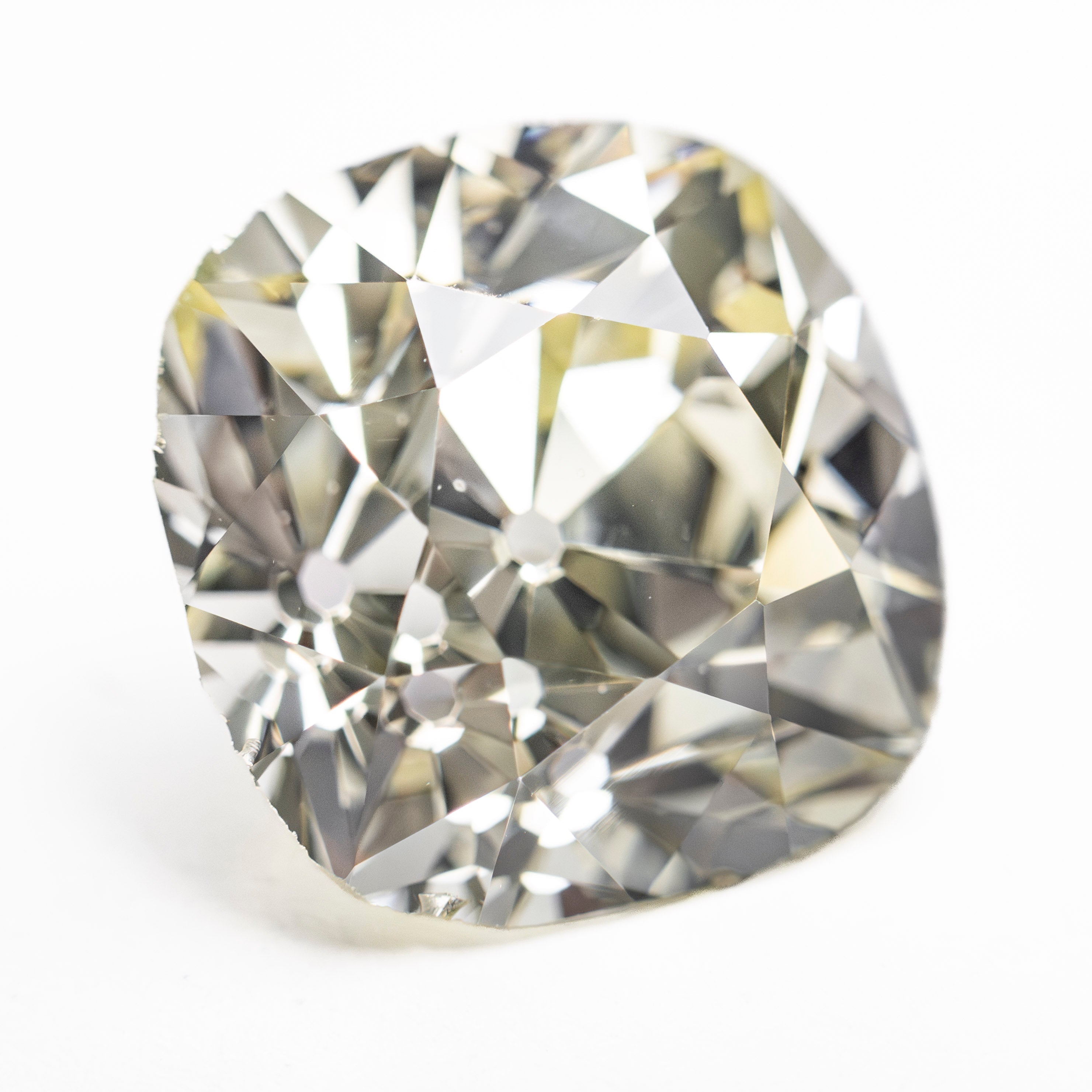 The 8.86ct 12.26x12.17x9.14mm GIA VS2 S-T Antique Old Mine Cut 27425-01 by East London jeweller Rachel Boston | Discover our collections of unique and timeless engagement rings, wedding rings, and modern fine jewellery.