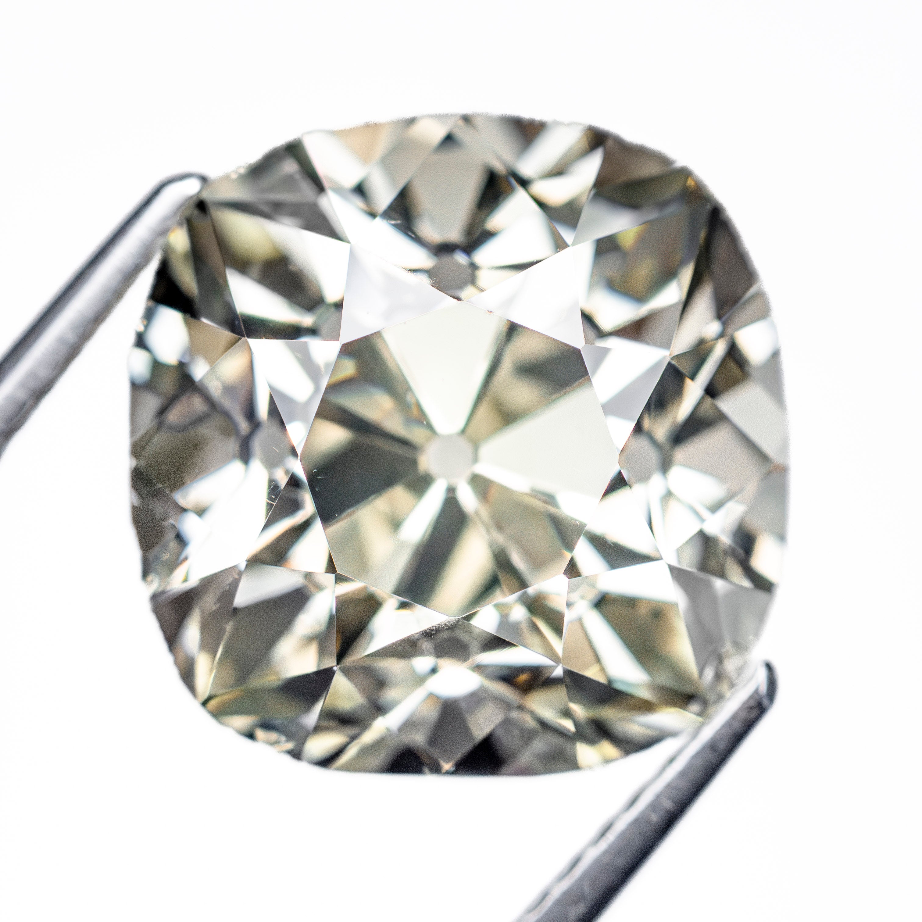 The 8.86ct 12.26x12.17x9.14mm GIA VS2 S-T Antique Old Mine Cut 27425-01 by East London jeweller Rachel Boston | Discover our collections of unique and timeless engagement rings, wedding rings, and modern fine jewellery.