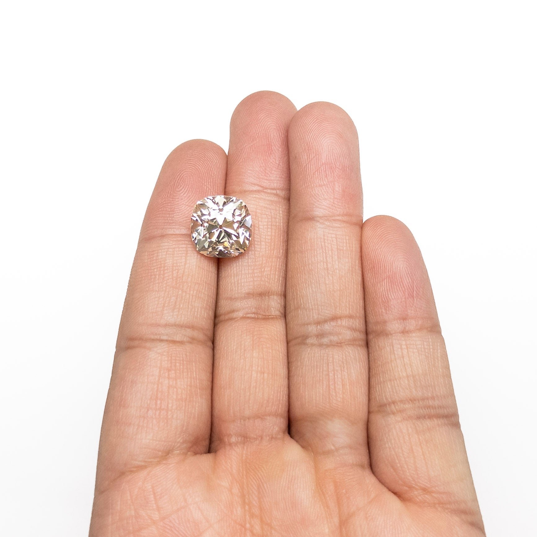 The 8.86ct 12.26x12.17x9.14mm GIA VS2 S-T Antique Old Mine Cut 27425-01 by East London jeweller Rachel Boston | Discover our collections of unique and timeless engagement rings, wedding rings, and modern fine jewellery.
