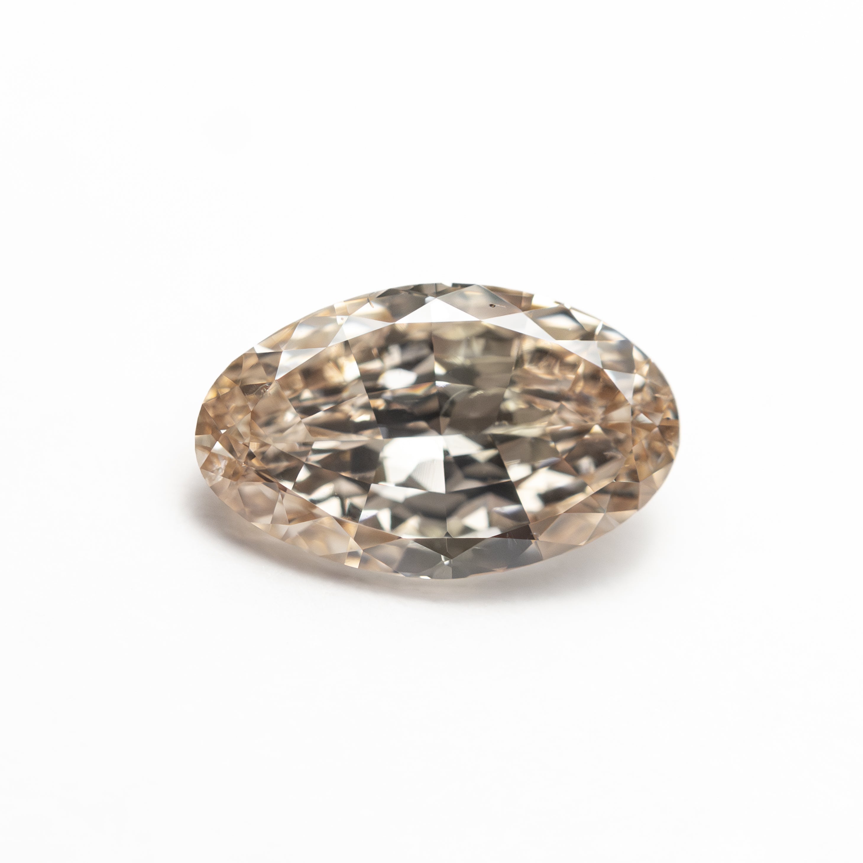 The 1.02ct 8.89x5.40x2.95mm SI2 C3 Oval Brilliant 🇨🇦 27518-08 by East London jeweller Rachel Boston | Discover our collections of unique and timeless engagement rings, wedding rings, and modern fine jewellery.