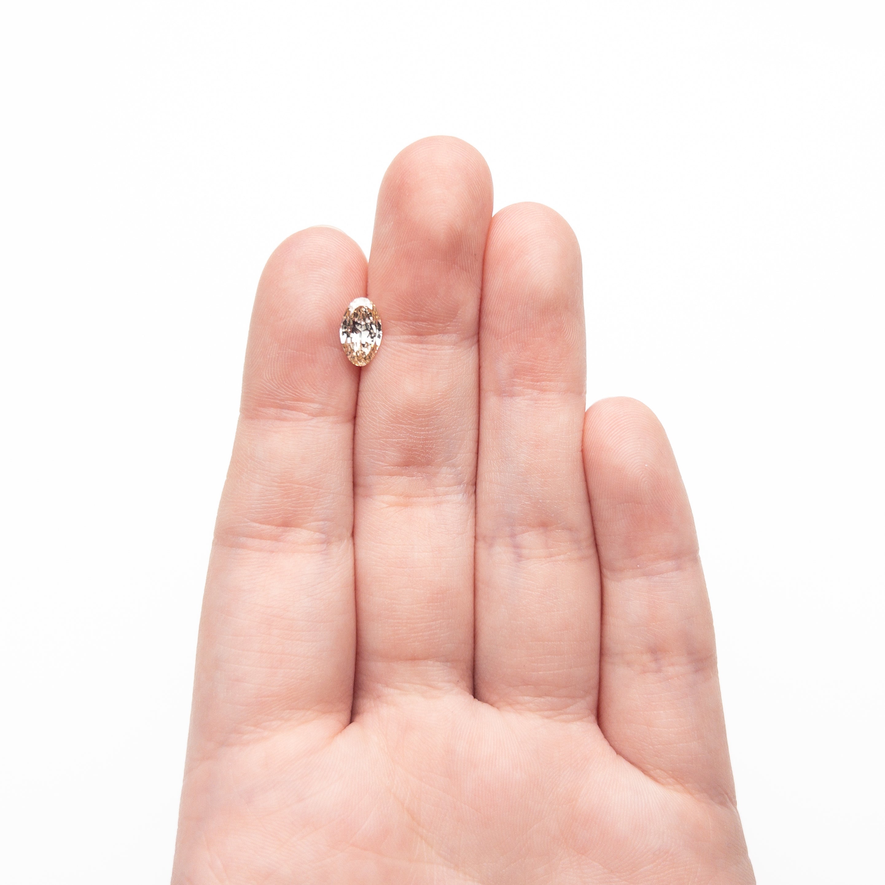 The 1.02ct 8.89x5.40x2.95mm SI2 C3 Oval Brilliant 🇨🇦 27518-08 by East London jeweller Rachel Boston | Discover our collections of unique and timeless engagement rings, wedding rings, and modern fine jewellery.