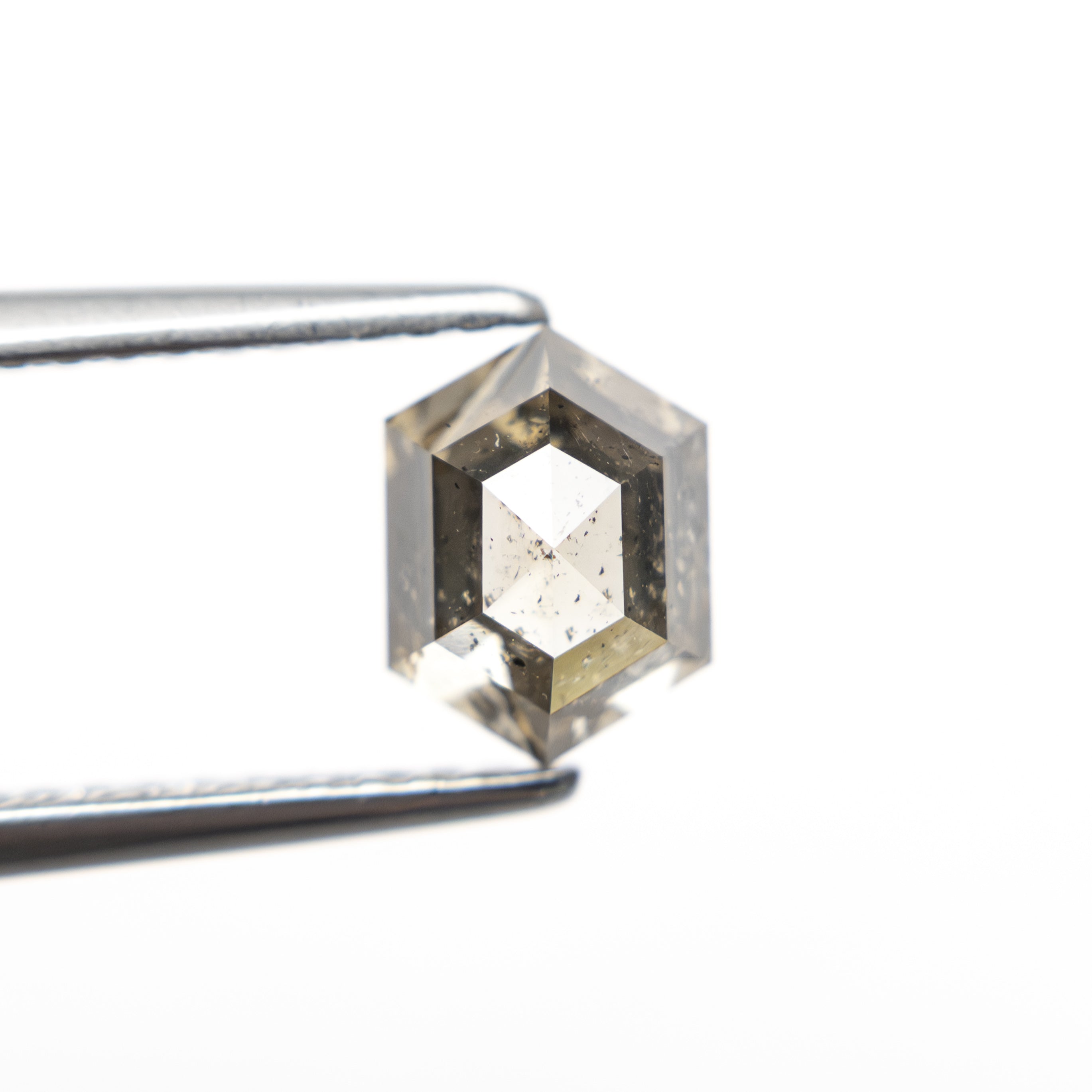 The 1.26ct 7.09x5.30x3.92mm Hexagon Rosecut 27537-38 by East London jeweller Rachel Boston | Discover our collections of unique and timeless engagement rings, wedding rings, and modern fine jewellery.