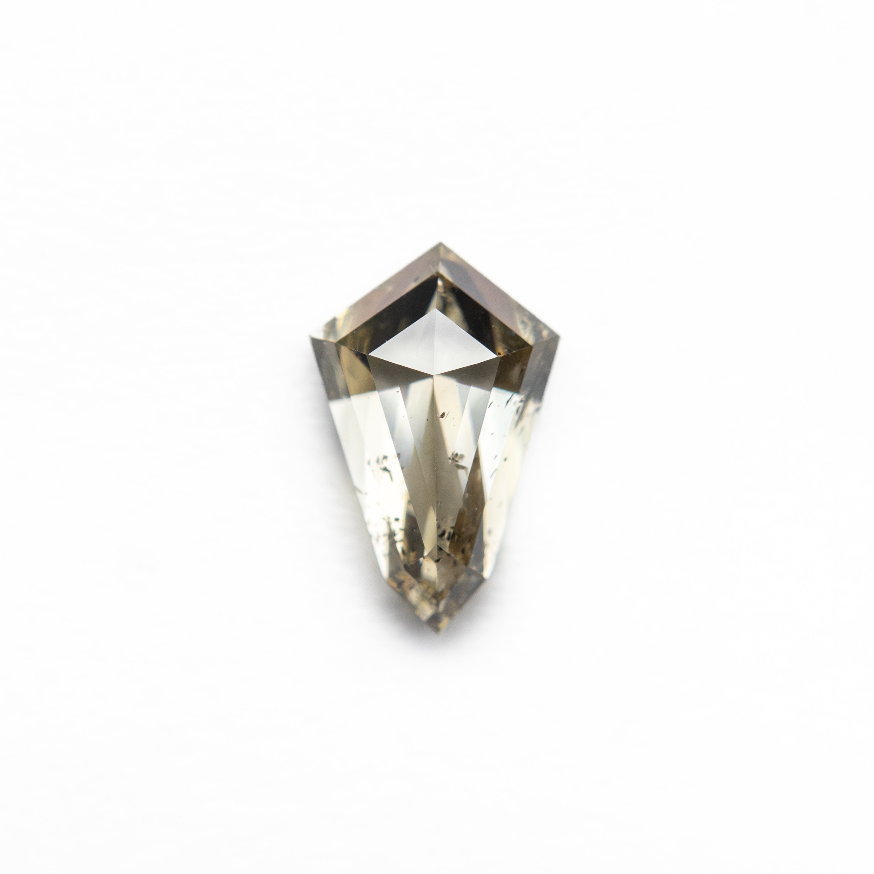The 0.59ct 7.54x4.84x2.54mm Shield Rosecut 27537-41 by East London jeweller Rachel Boston | Discover our collections of unique and timeless engagement rings, wedding rings, and modern fine jewellery.