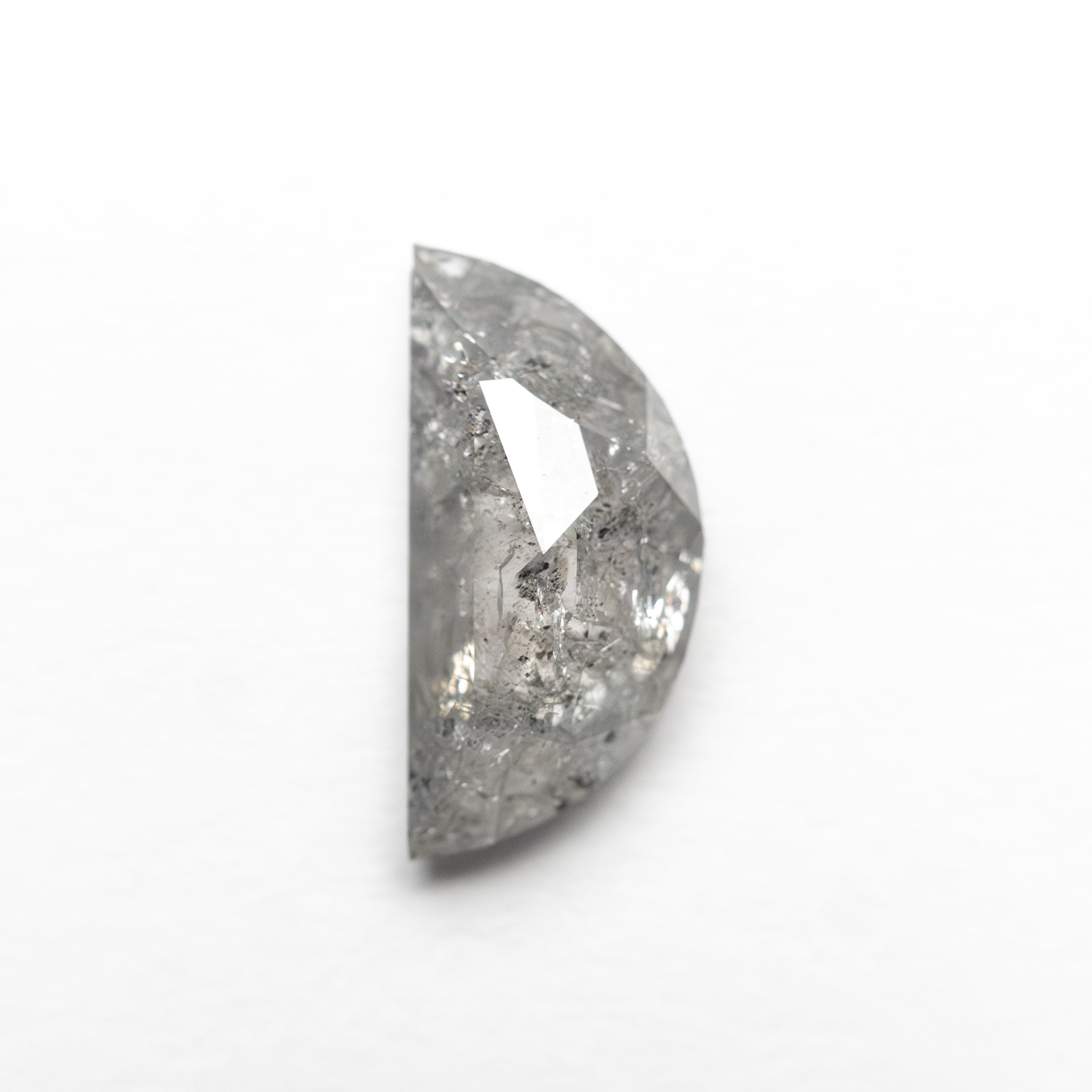 The 0.90ct 9.31x4.46x2.44mm Half Moon Rosecut 27545-09 by East London jeweller Rachel Boston | Discover our collections of unique and timeless engagement rings, wedding rings, and modern fine jewellery.