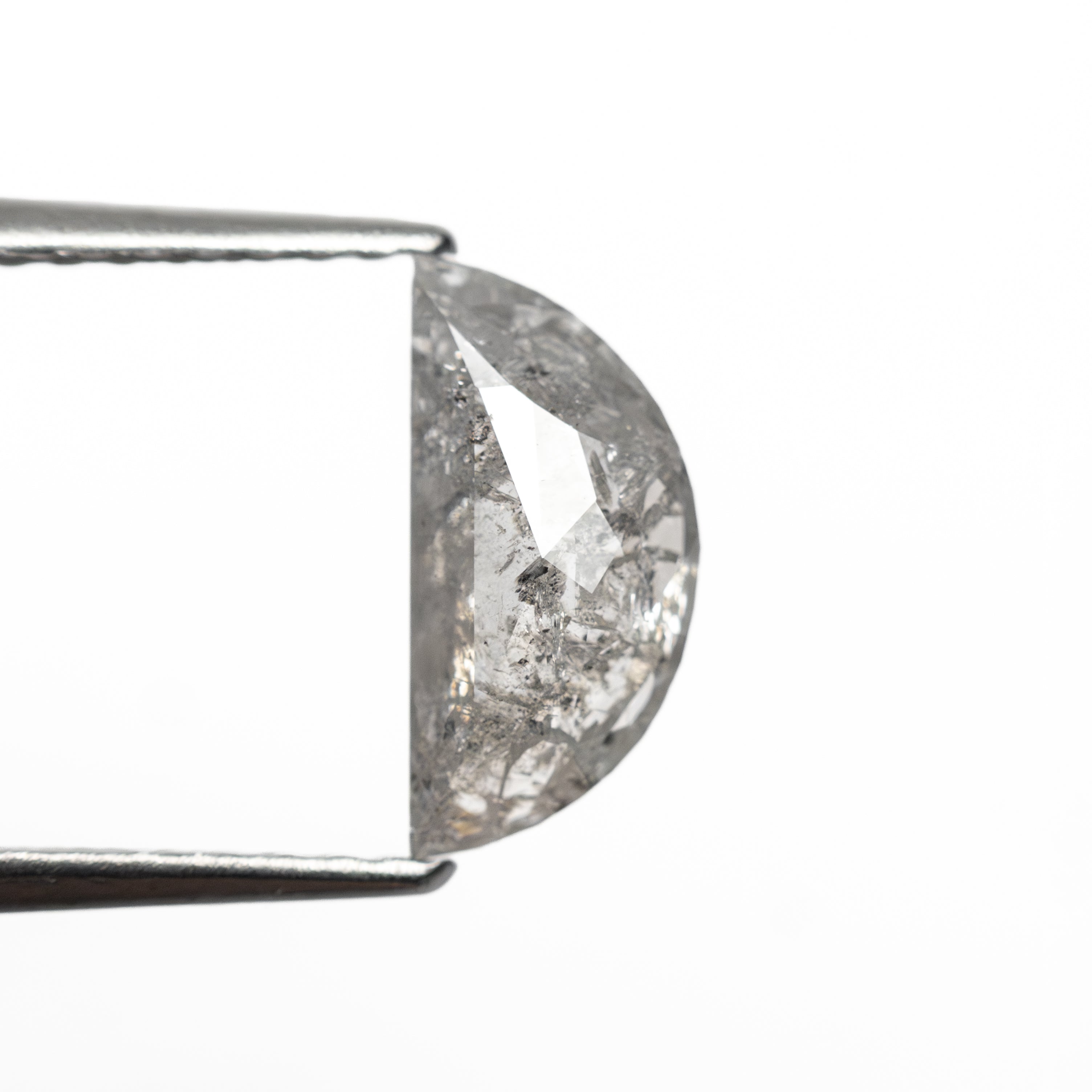 The 0.90ct 9.31x4.46x2.44mm Half Moon Rosecut 27545-09 by East London jeweller Rachel Boston | Discover our collections of unique and timeless engagement rings, wedding rings, and modern fine jewellery.