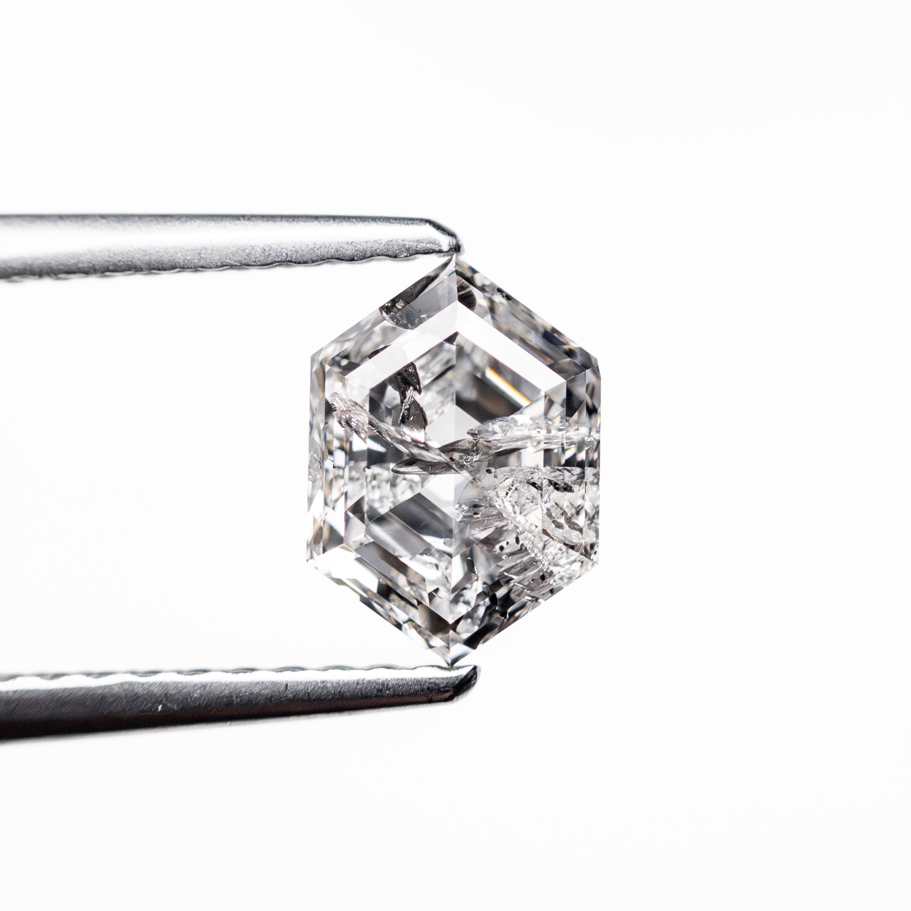 The 1.10ct 7.48x5.29x3.68mm Hexagon Step Cut 🇨🇦 27588-01 by East London jeweller Rachel Boston | Discover our collections of unique and timeless engagement rings, wedding rings, and modern fine jewellery.