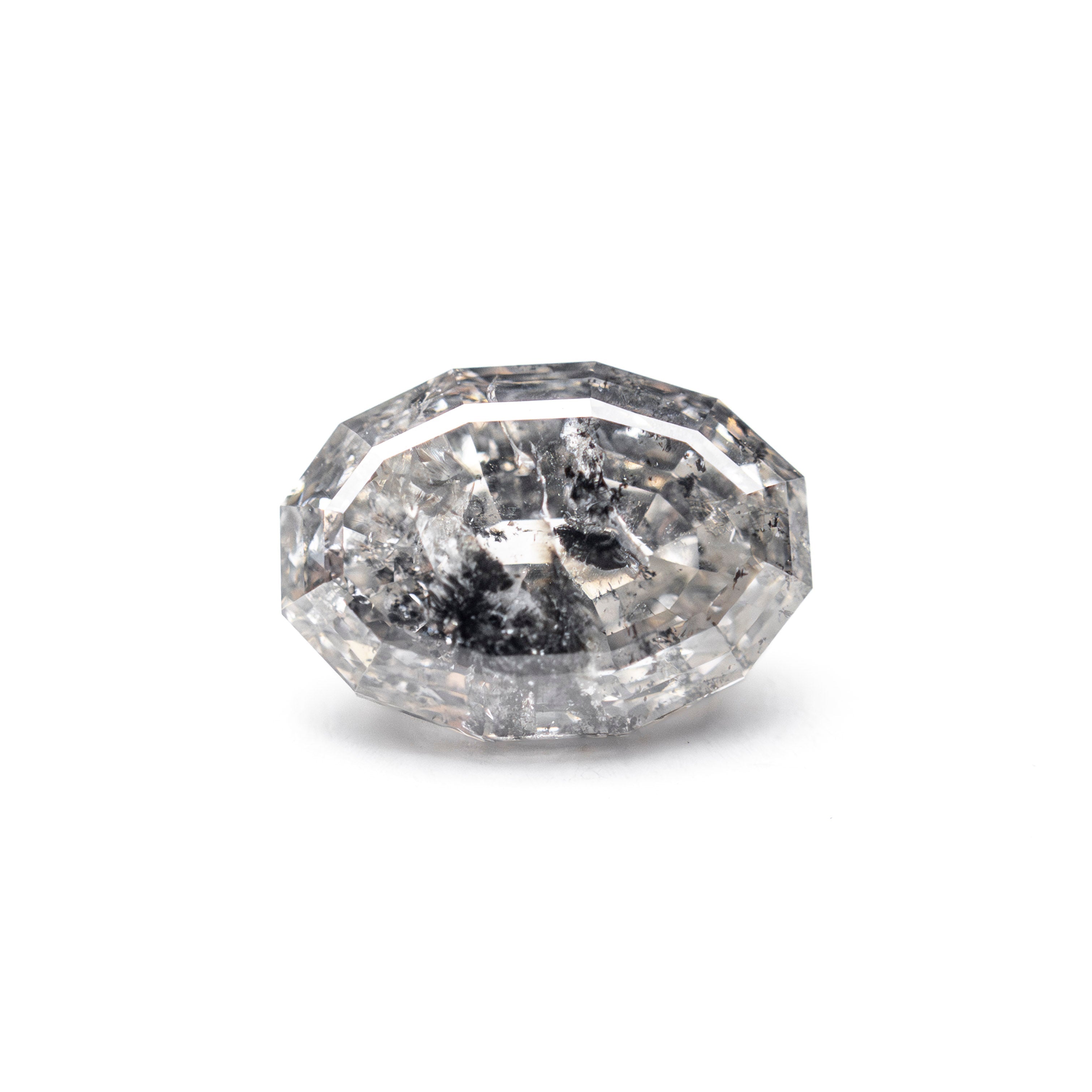 The 1.57ct 7.93x5.69mm Geo Oval Step Cut 🇨🇦 27638-01 by East London jeweller Rachel Boston | Discover our collections of unique and timeless engagement rings, wedding rings, and modern fine jewellery.