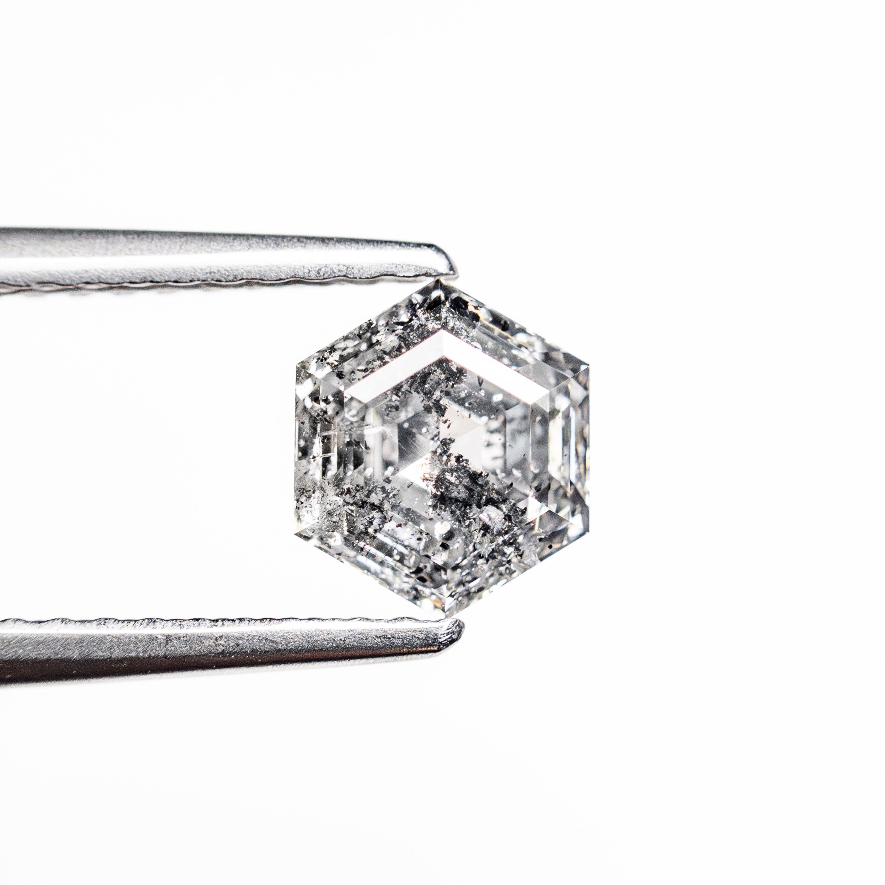 The 1.04ct 6.40x5.60x3.76mm Hexagon Step Cut 🇨🇦 27643-01 by East London jeweller Rachel Boston | Discover our collections of unique and timeless engagement rings, wedding rings, and modern fine jewellery.
