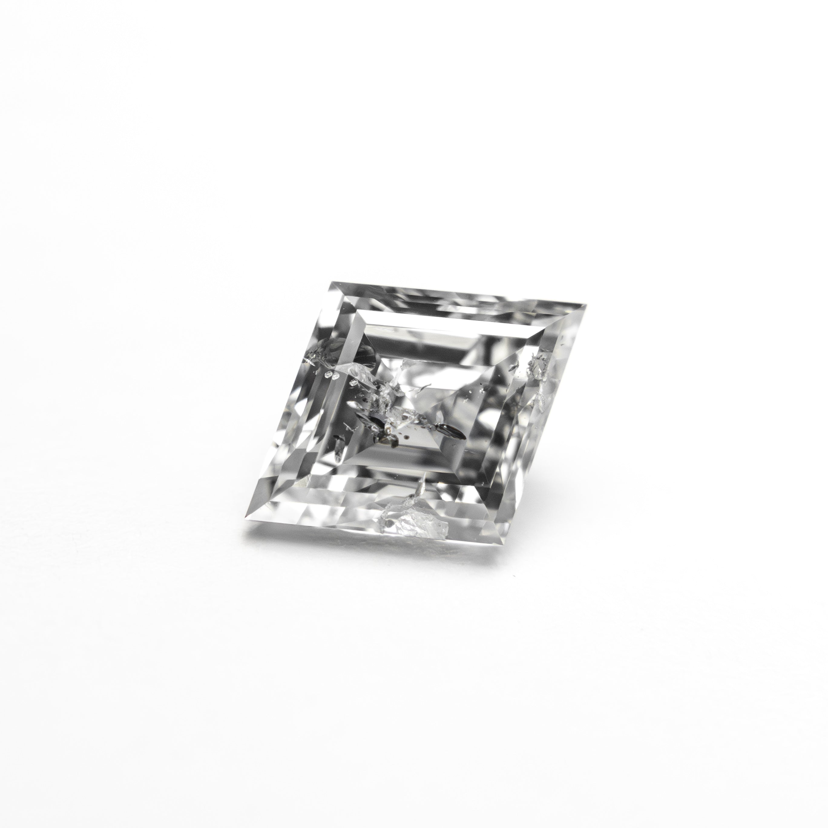 The 0.93ct 8.14x6.30x3.69mm Lozenge Step Cut 🇨🇦 27680-01 by East London jeweller Rachel Boston | Discover our collections of unique and timeless engagement rings, wedding rings, and modern fine jewellery.