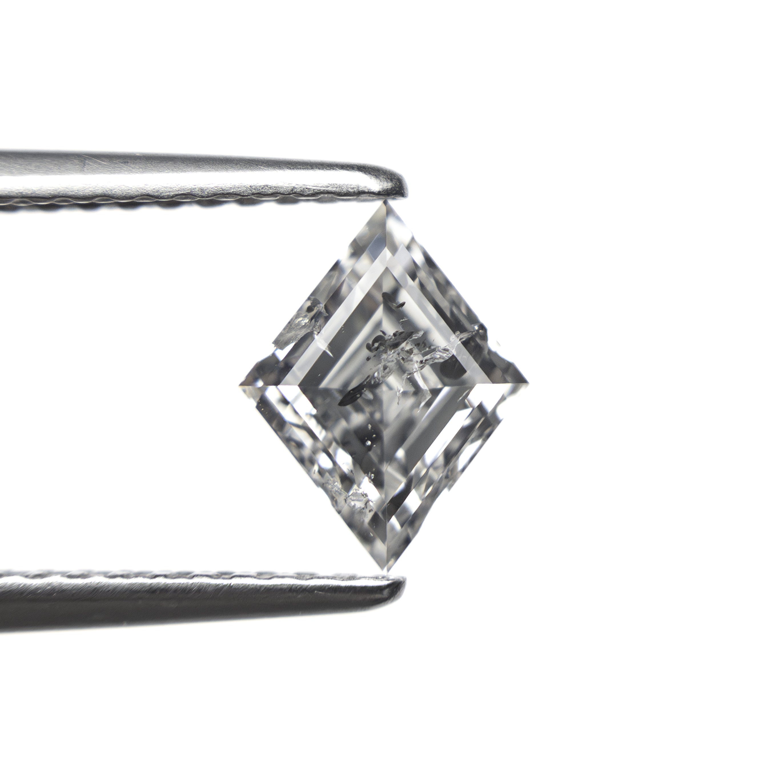 The 0.93ct 8.14x6.30x3.69mm Lozenge Step Cut 🇨🇦 27680-01 by East London jeweller Rachel Boston | Discover our collections of unique and timeless engagement rings, wedding rings, and modern fine jewellery.