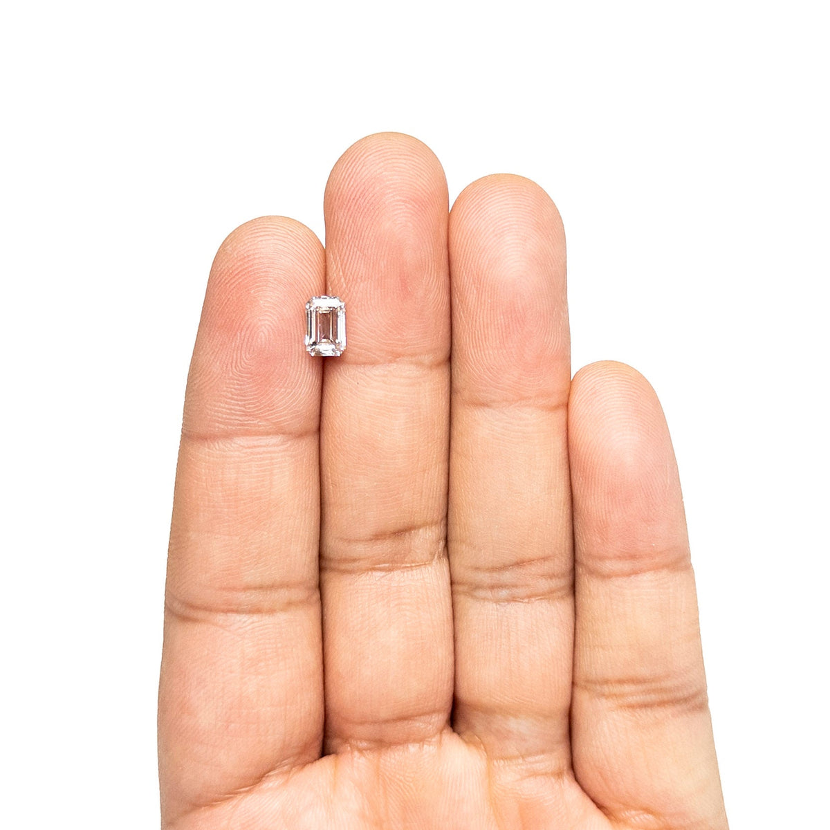 The 1.08ct 7.04x4.68x3.11mm Cut Corner Rectangle Step Cut 🇨🇦 27684-01 by East London jeweller Rachel Boston | Discover our collections of unique and timeless engagement rings, wedding rings, and modern fine jewellery.