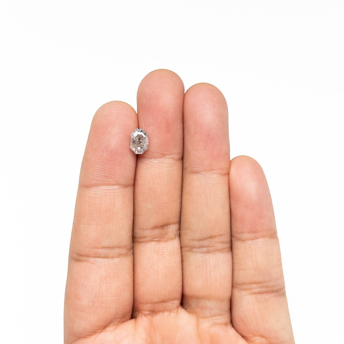 The 1.50ct 7.49x5.44x3.98mm Cut Corner Rectangle Step Cut 🇨🇦 27685-01 by East London jeweller Rachel Boston | Discover our collections of unique and timeless engagement rings, wedding rings, and modern fine jewellery.