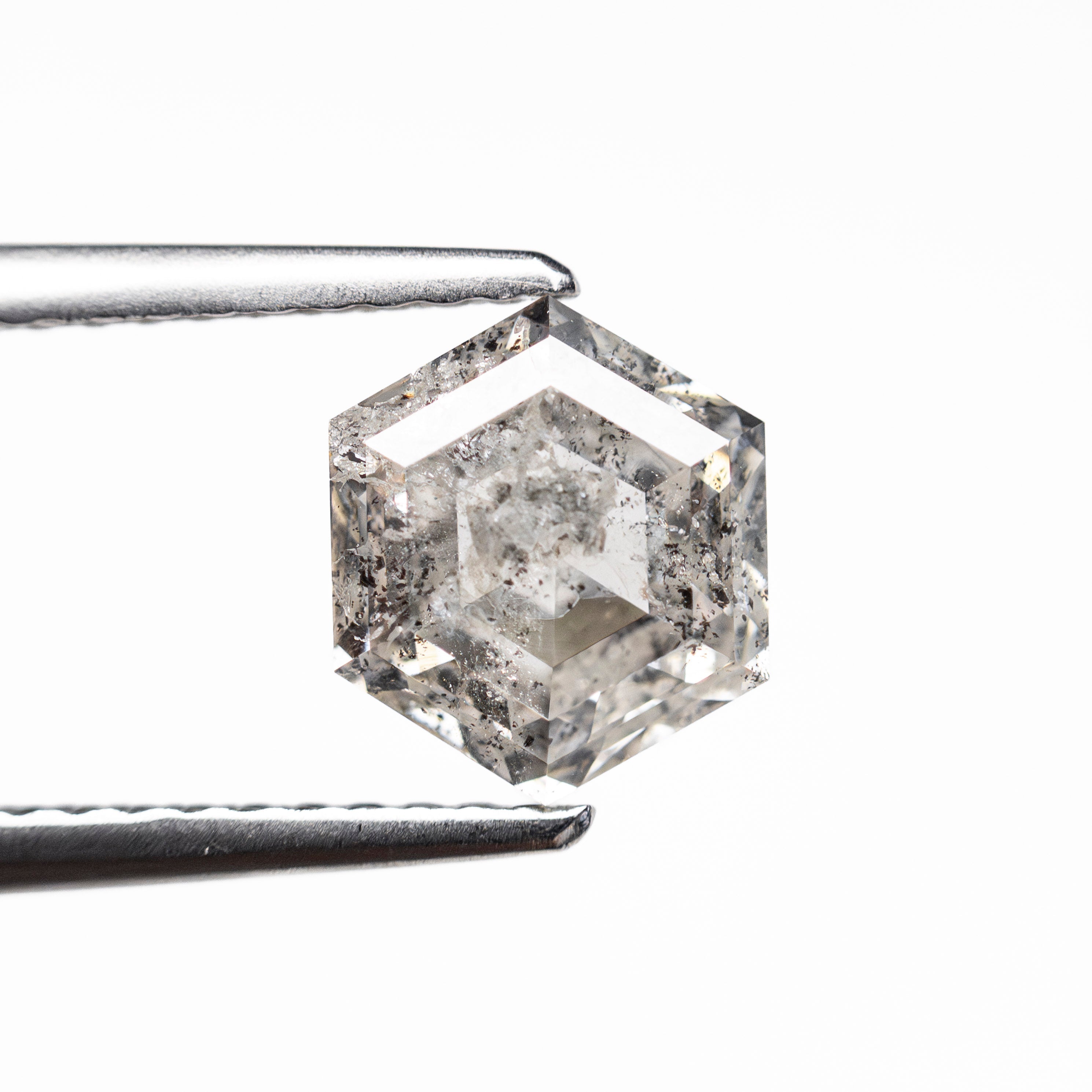 The 1.69ct 7.63x6.60x4.04mm Hexagon Step Cut 🇨🇦 27686-01 by East London jeweller Rachel Boston | Discover our collections of unique and timeless engagement rings, wedding rings, and modern fine jewellery.