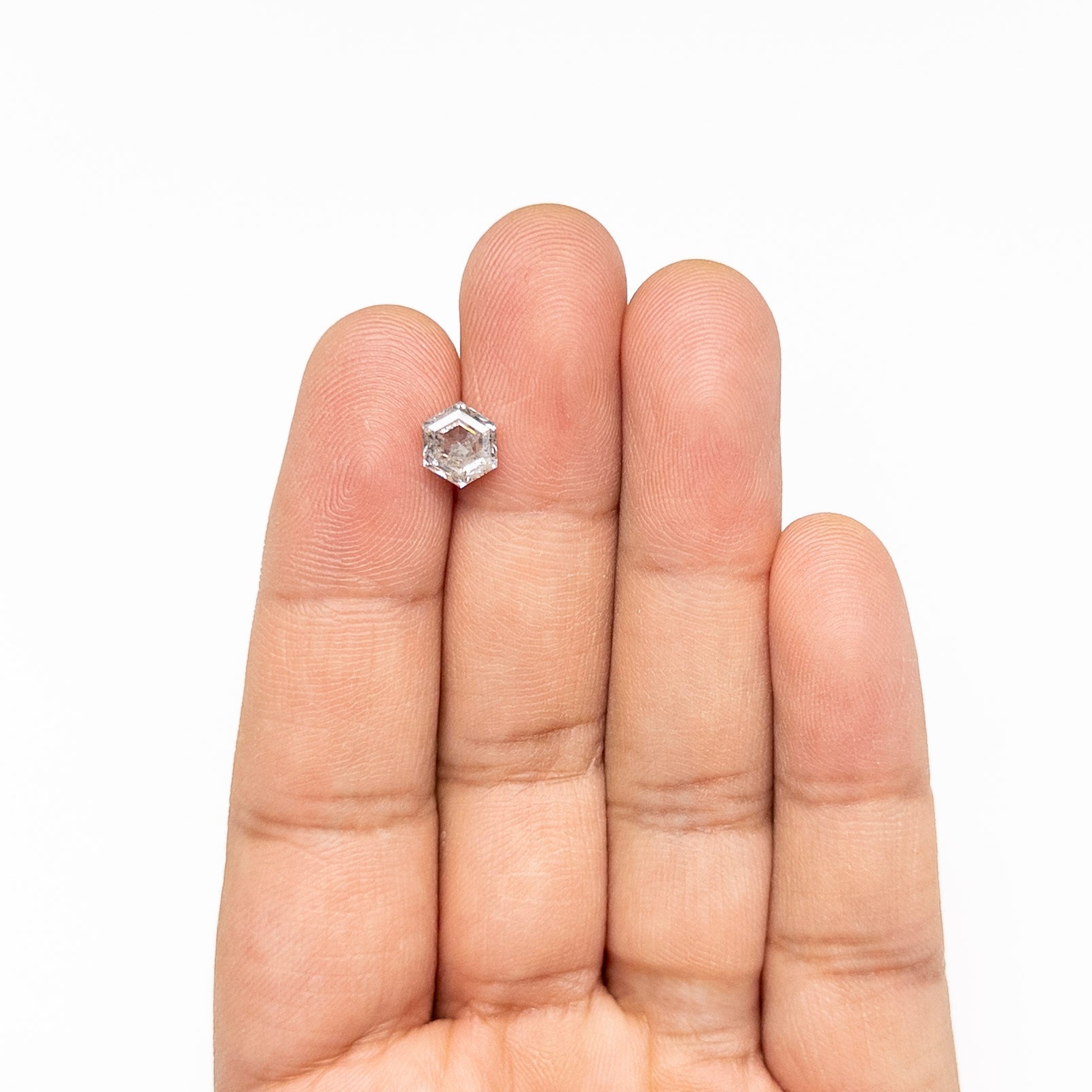 The 1.69ct 7.63x6.60x4.04mm Hexagon Step Cut 🇨🇦 27686-01 by East London jeweller Rachel Boston | Discover our collections of unique and timeless engagement rings, wedding rings, and modern fine jewellery.
